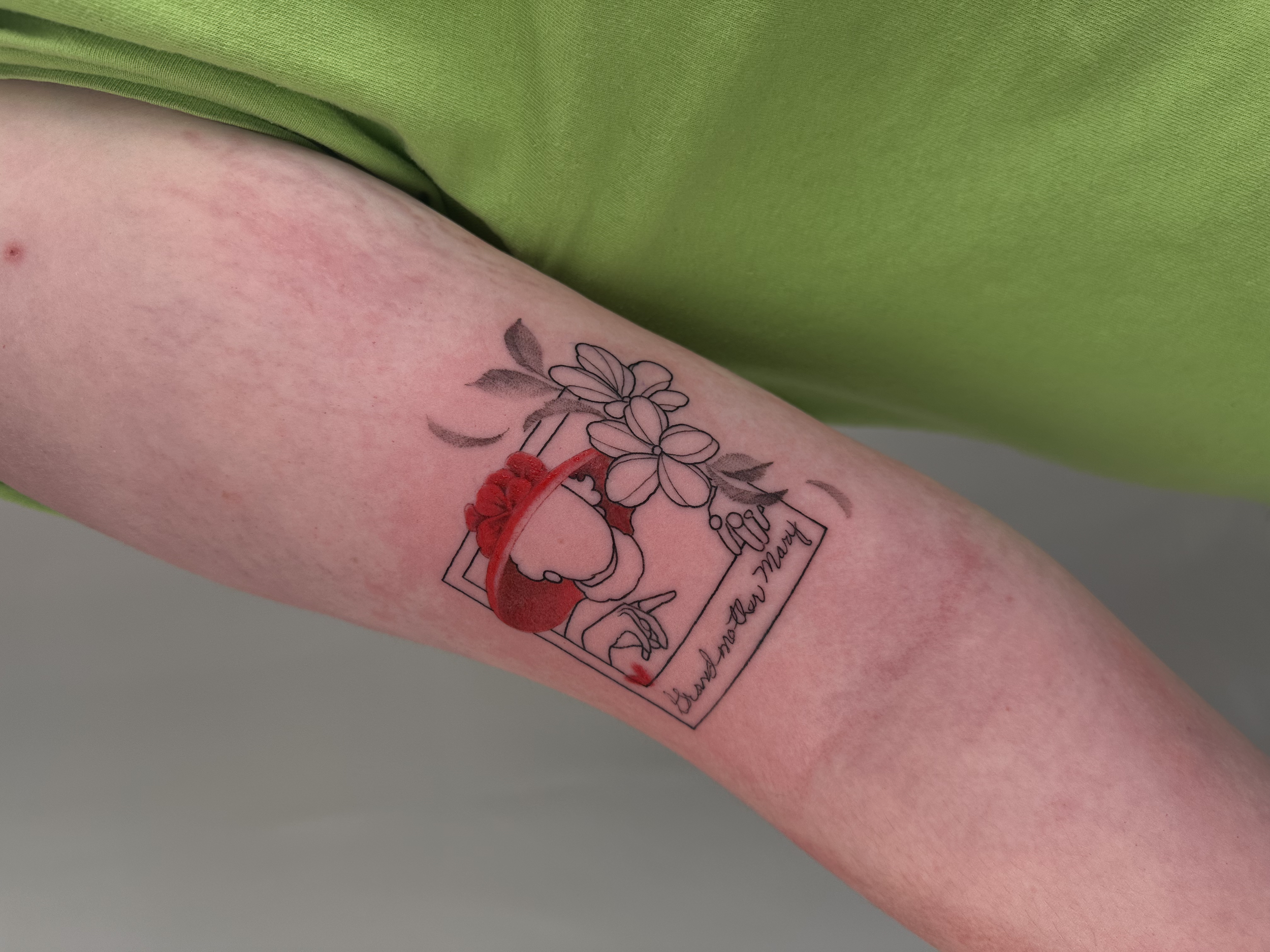 grandmothers portrait memorial , upper arm· 1 session · [fineline] [color] [palmsized]