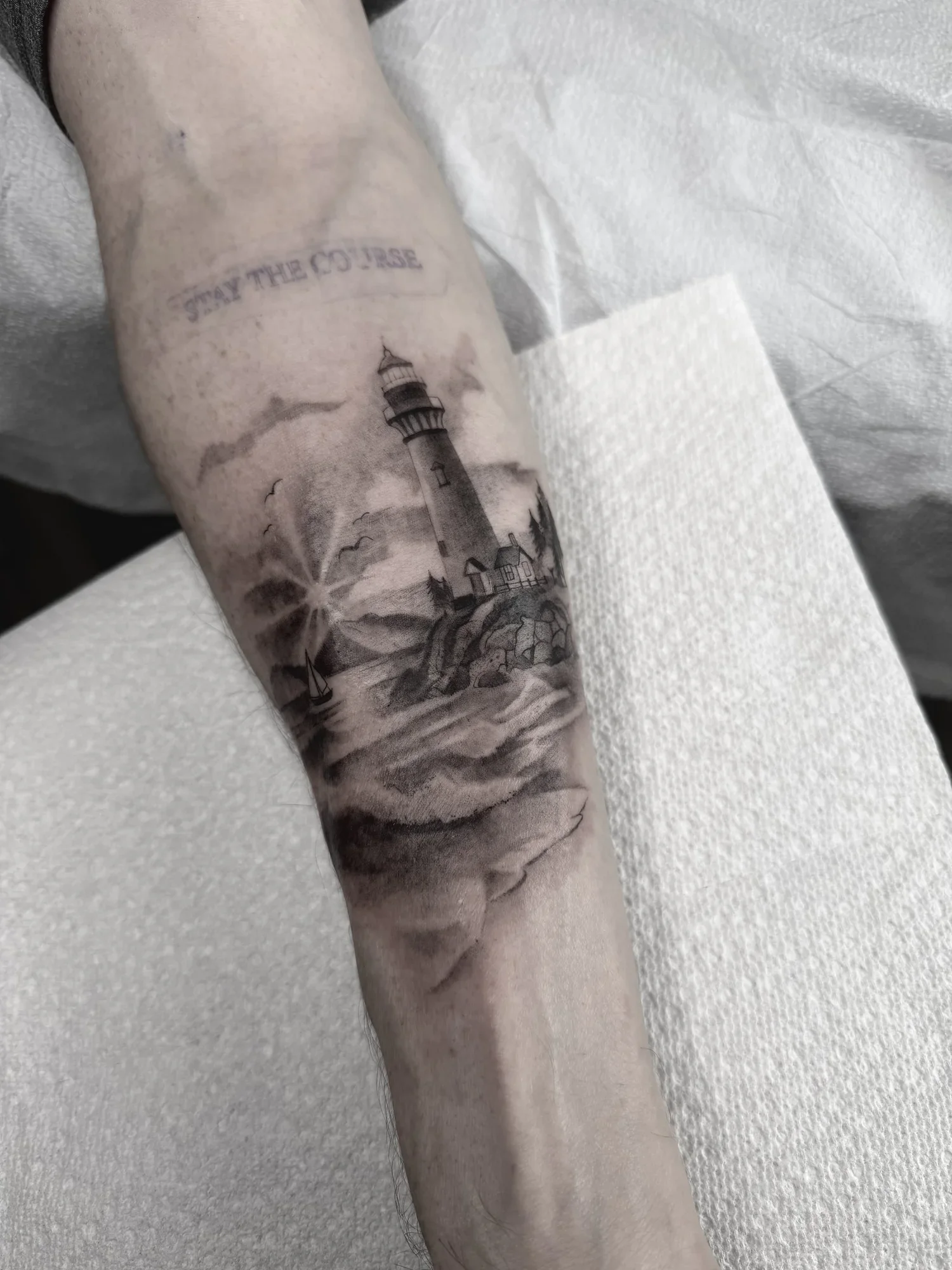 Lighthouse, forearm · 1  sessions · [blackgrey] [Handsized]