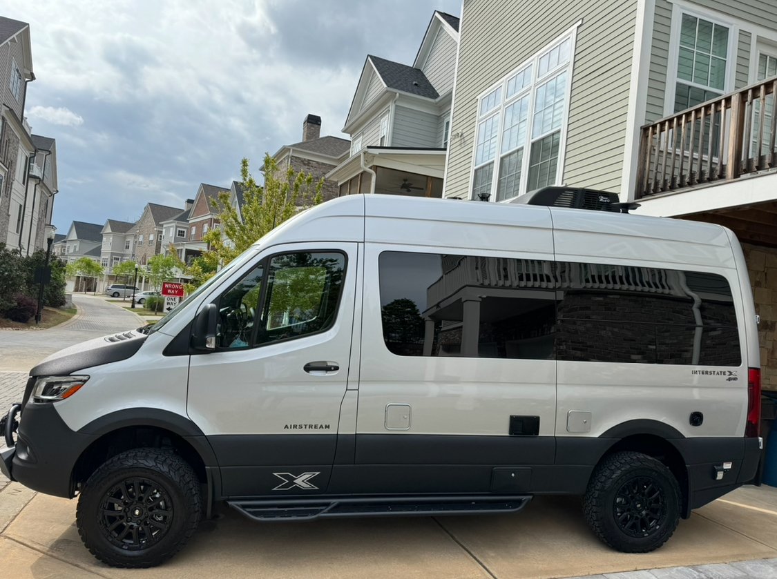 Deep gloss ceramic coating applied to a Mercedes camper in Alpharetta and Roswell area on Haynes Bridge Road, providing long-lasting protection and shine. Ceramic coating near me, car detailing near me.