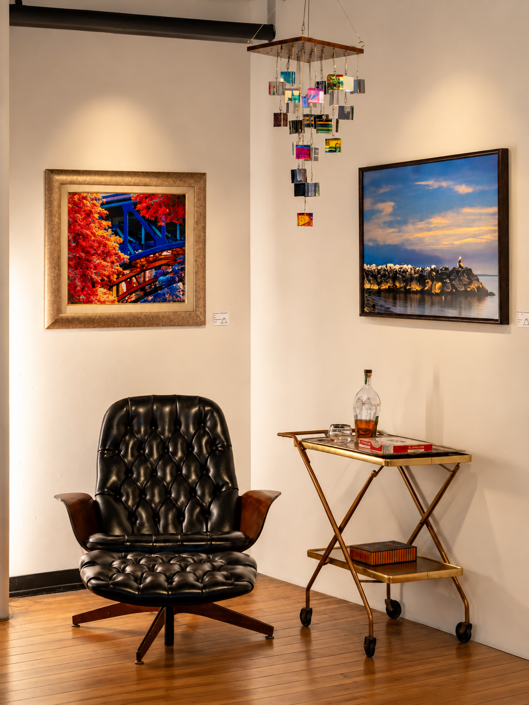 Throughout the gallery, intimate seating areas create places to pause, spend time with the work, and experience the space at a slower pace.