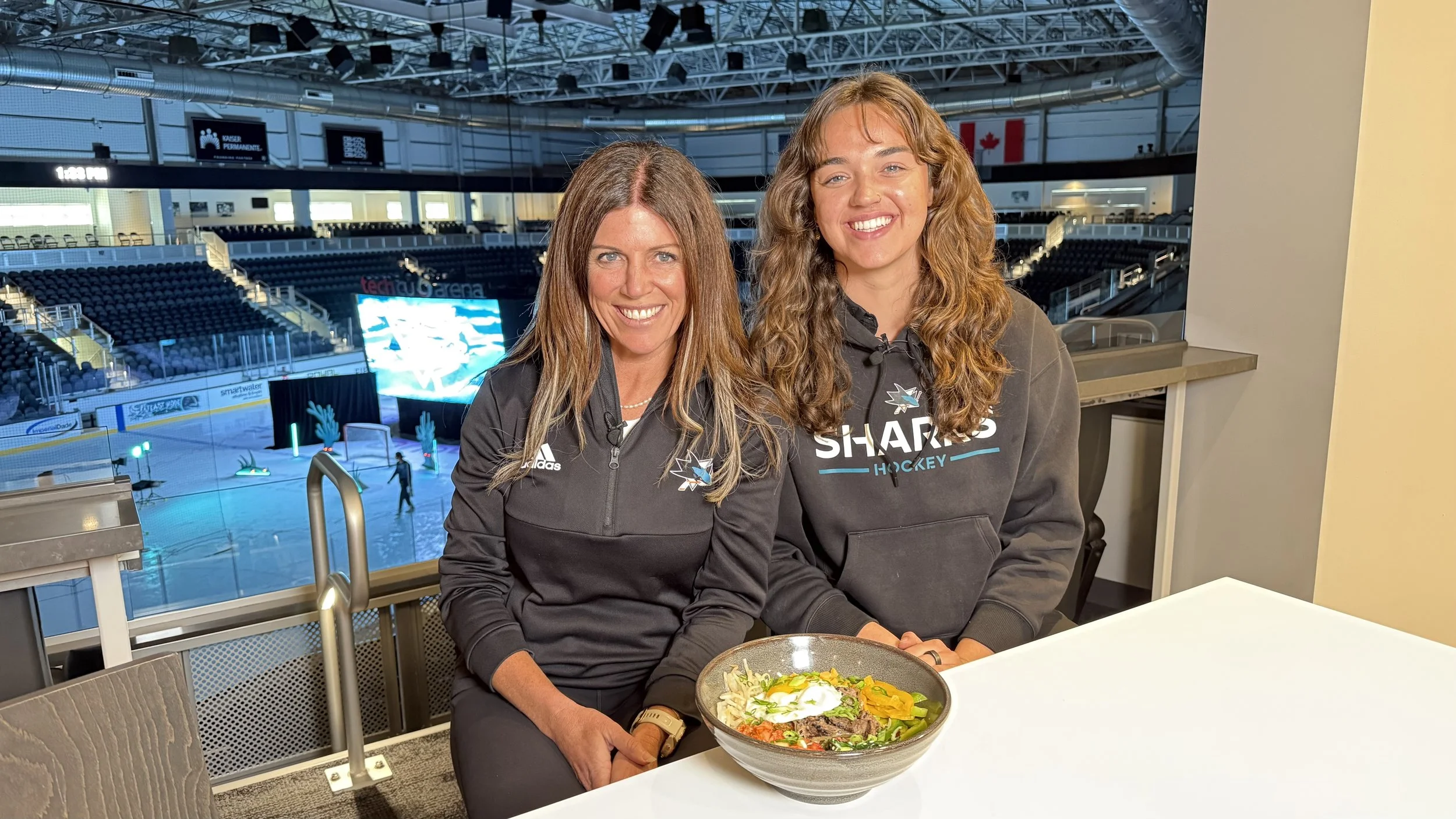 Ryann and co-worker at Sharks facility