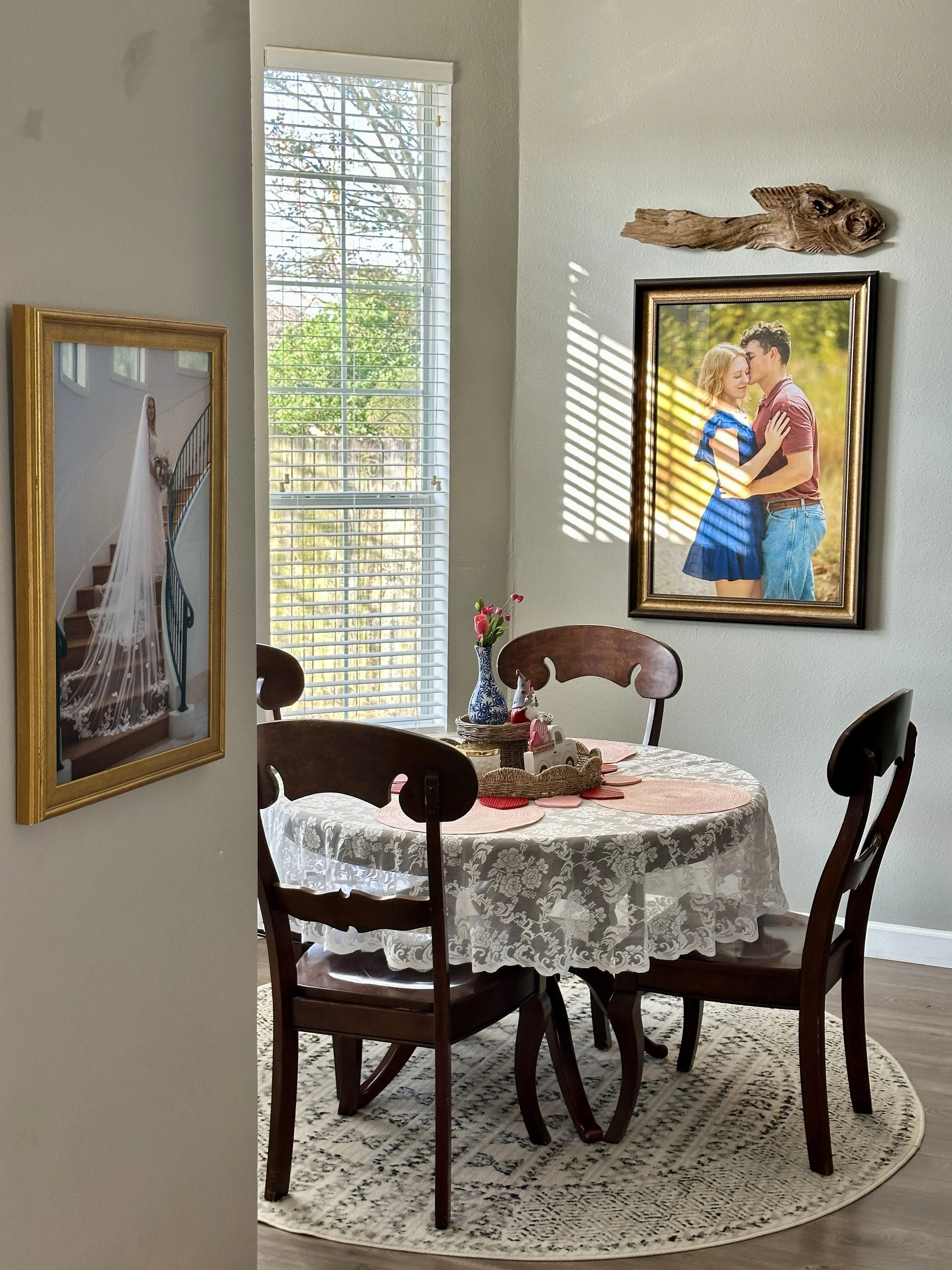 A bridal and engagement portrait proudly displayed in their first home together