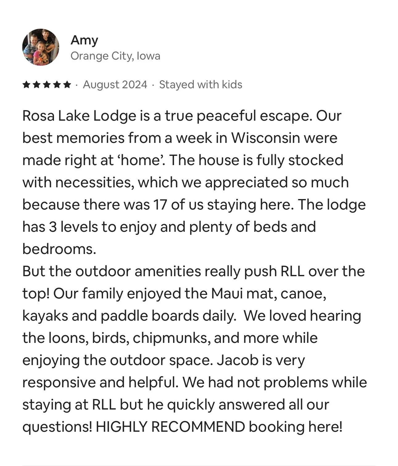 Review for Rosa Lake Lodge in Orange City, Iowa, praising outdoor amenities like kayak, canoe, and paddleboard rentals, and comfortable lodging with three levels and multiple beds.