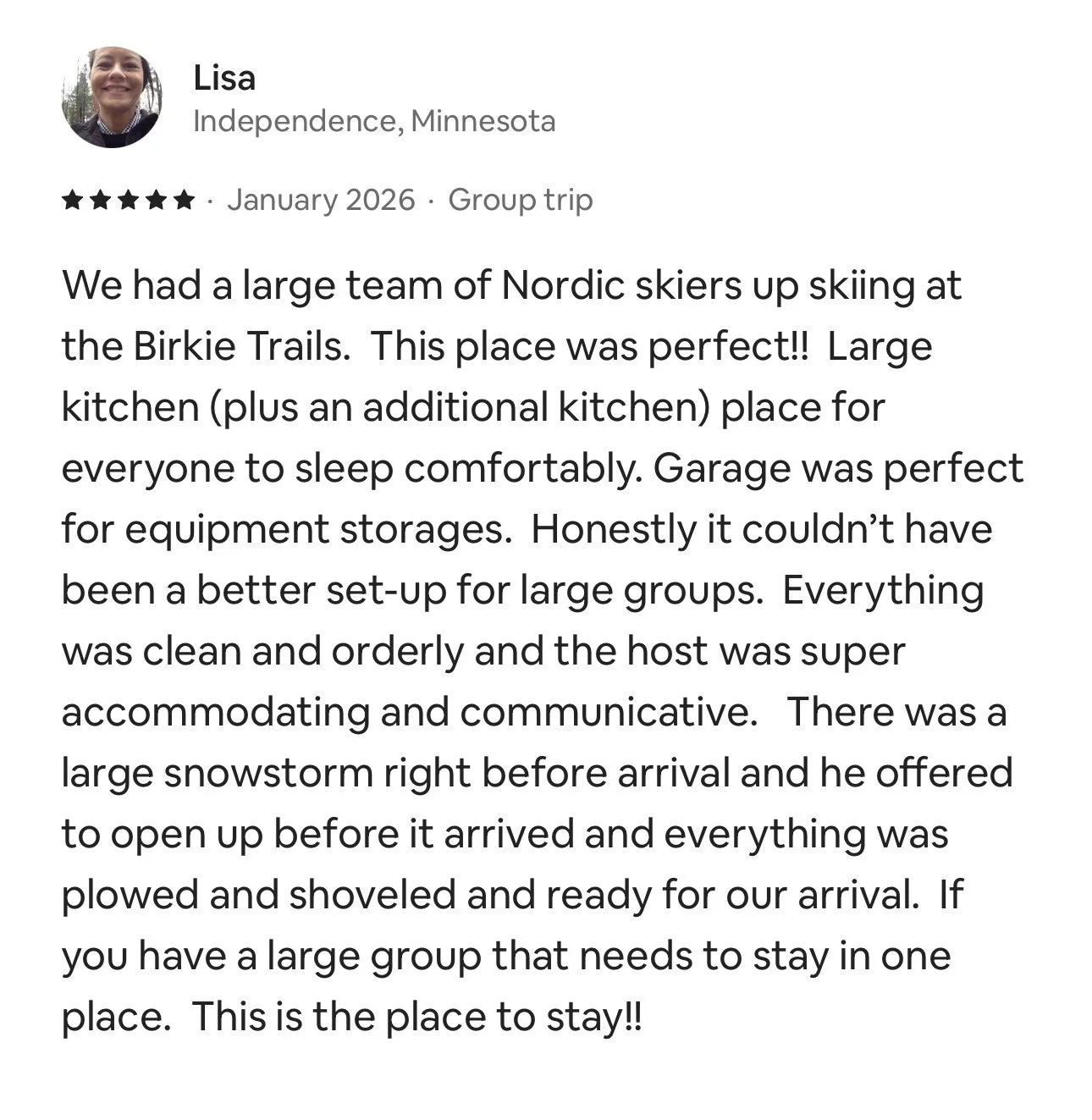 Review written by Lisa from Minnesota about her group trip to Birkie Trails, mentioning skiing by Nordic skiers, large kitchens, garage for equipment storage, snowstorm, and outdoor setup.