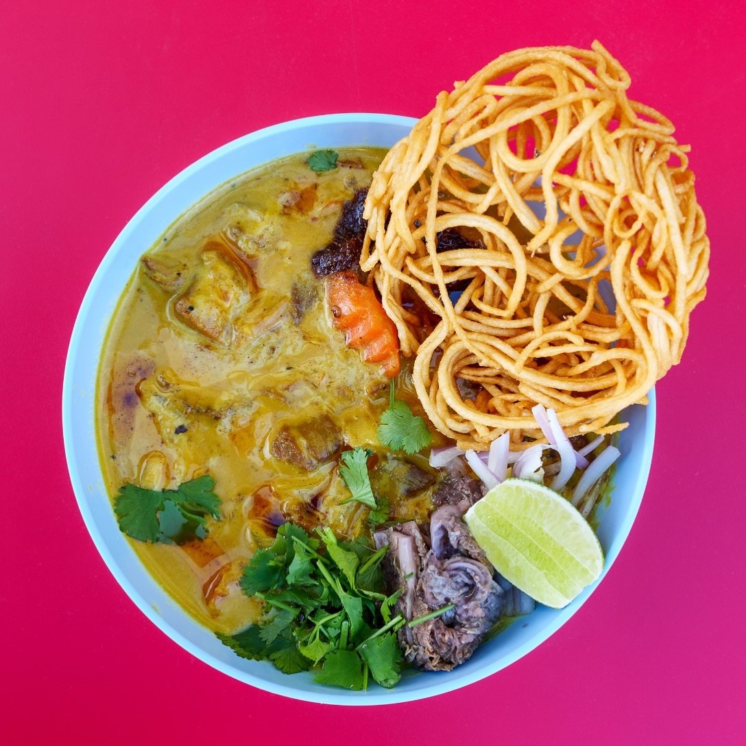 Kao Soi / a yellow coconut curry noodle soup hailing from Northern Thailand, Myanmar, and Laos. It consists of noodles in a thick, rich coconut broth, and @motleycrewranch pork.

There are many variations, including how the broth is made, what the pr