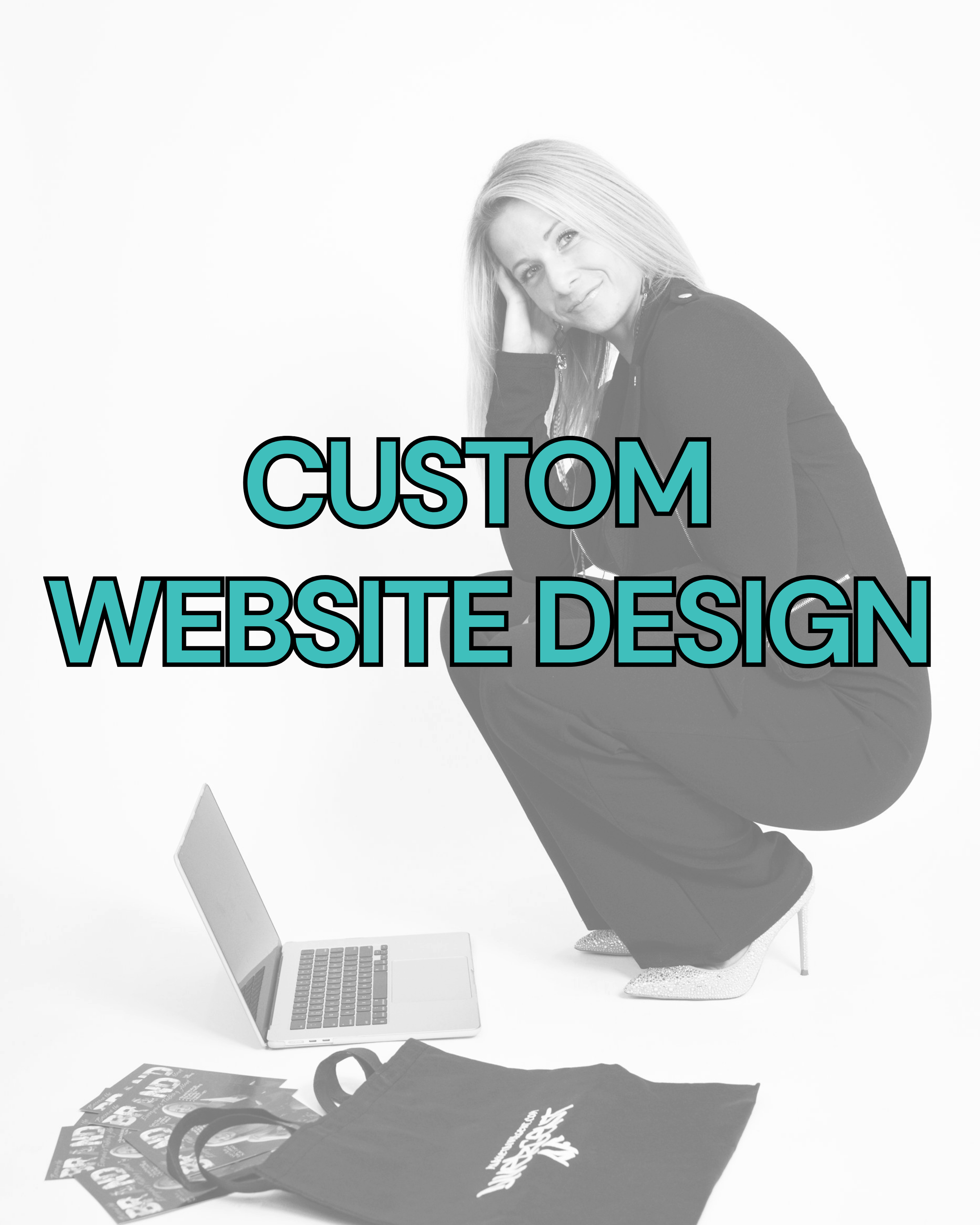 Black and white studio photo of a woman squatting next to a laptop, with a tote bag and flyers on the ground, overlaid with blue text reading 'CUSTOM WEBSITE DESIGN'.