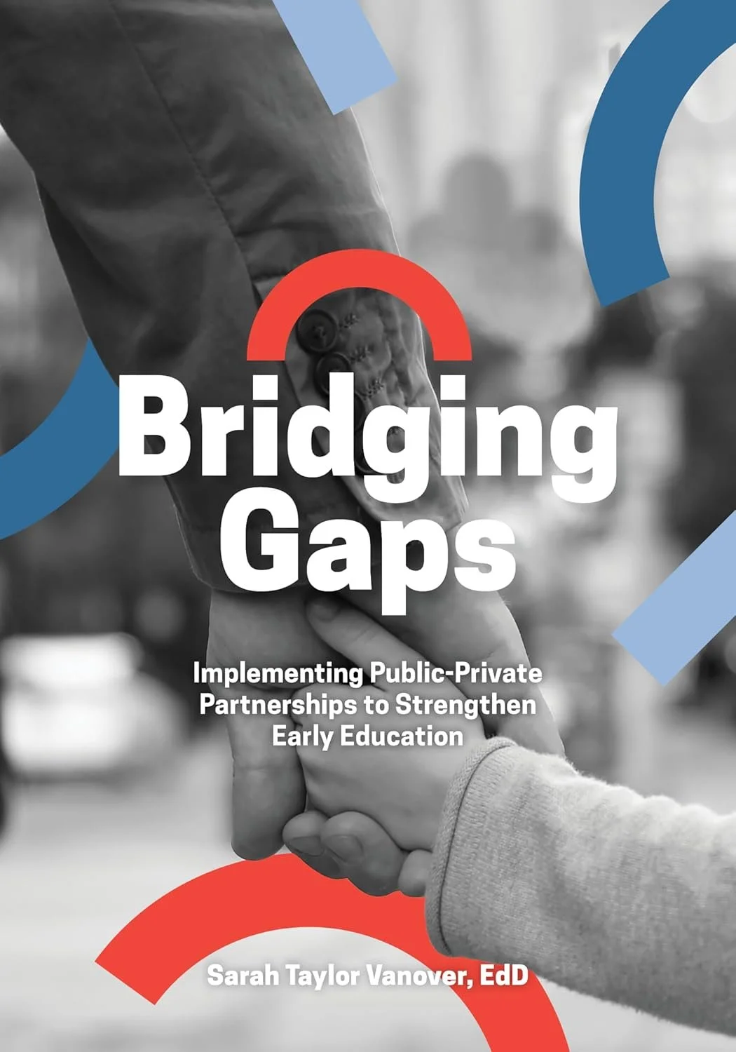 Black-and-white cover of an adult holding a child’s hand, with bold title and blue and red graphic arcs.