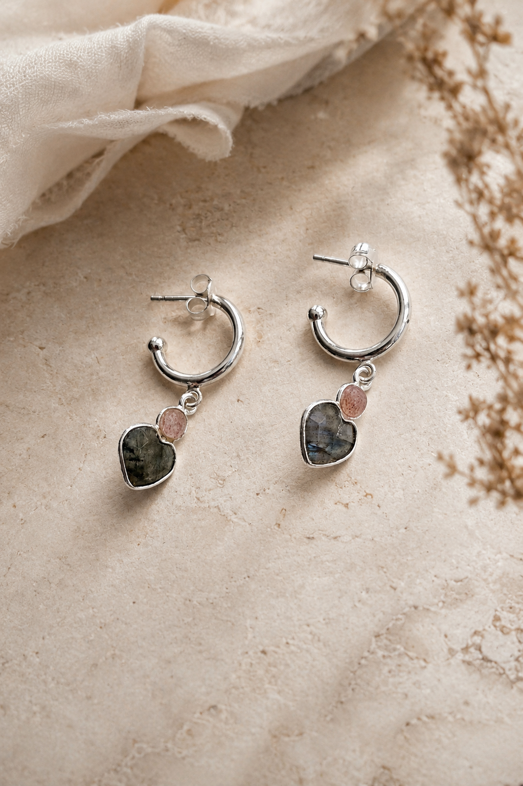 labradorite heart hoop earrings flatlay.png