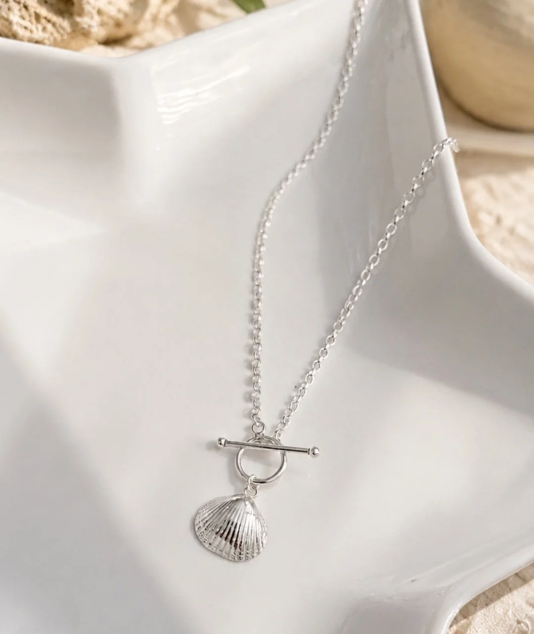 Shell necklace flatlay.jpg