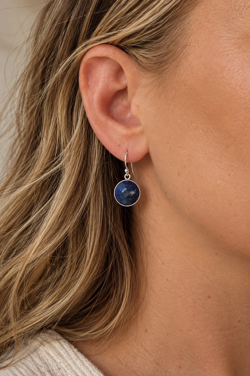 orund lapis charm earrings on model.png