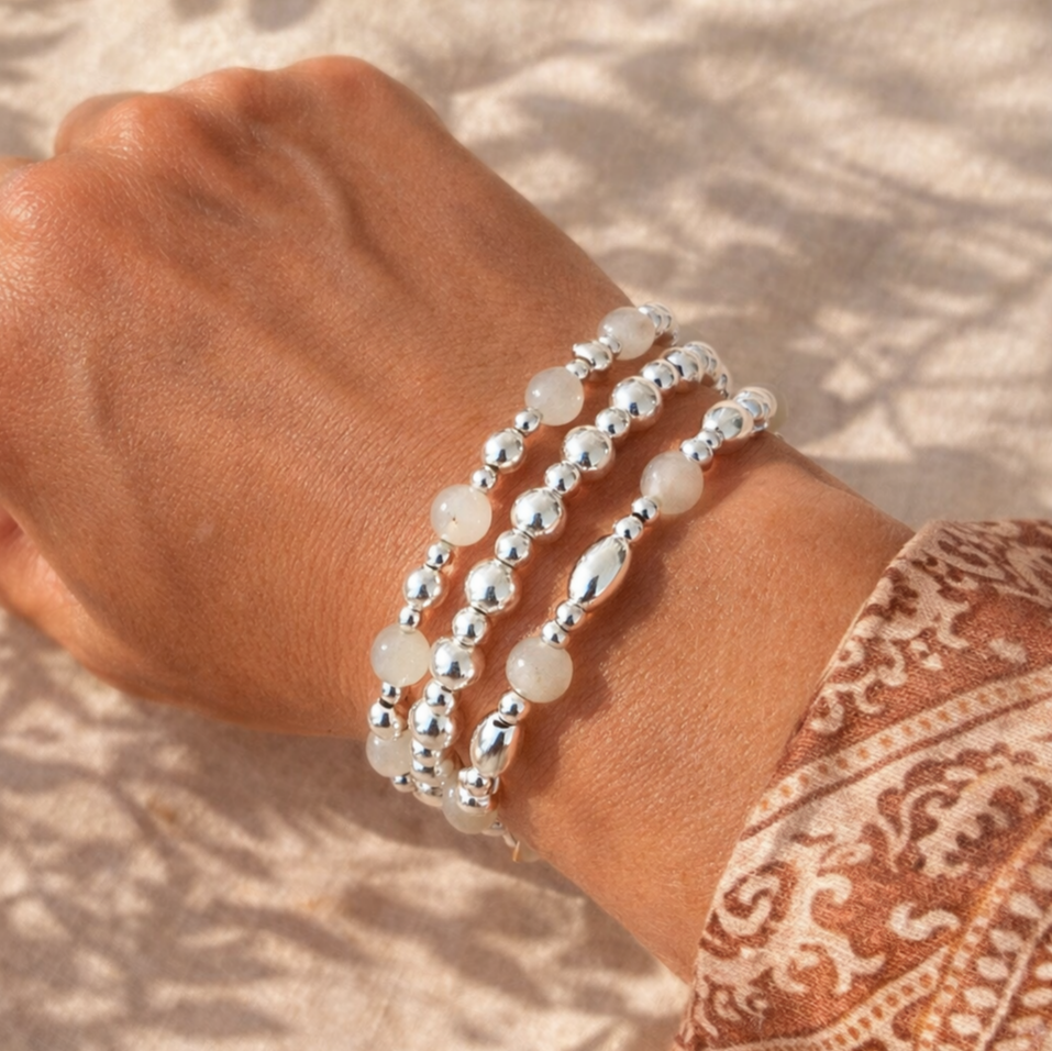 Stacked%2Bsilver%2Band%2Bmoonstone%2Bbracelets.png