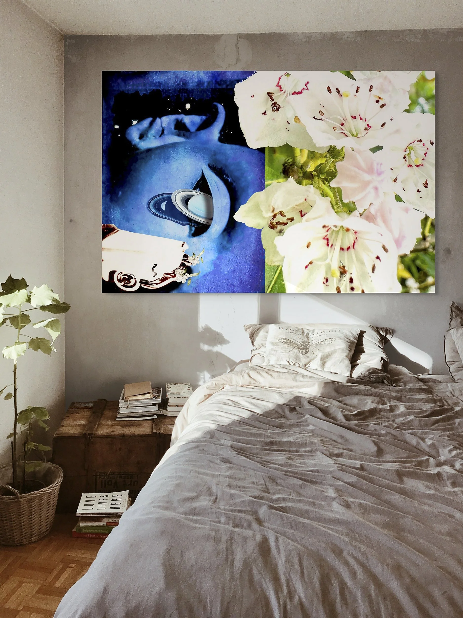 This mock-up shows print of Surreal digital composite, Nocturne and Laurel, installed on distressed plaster wall over rumpled bed in contemporary room.