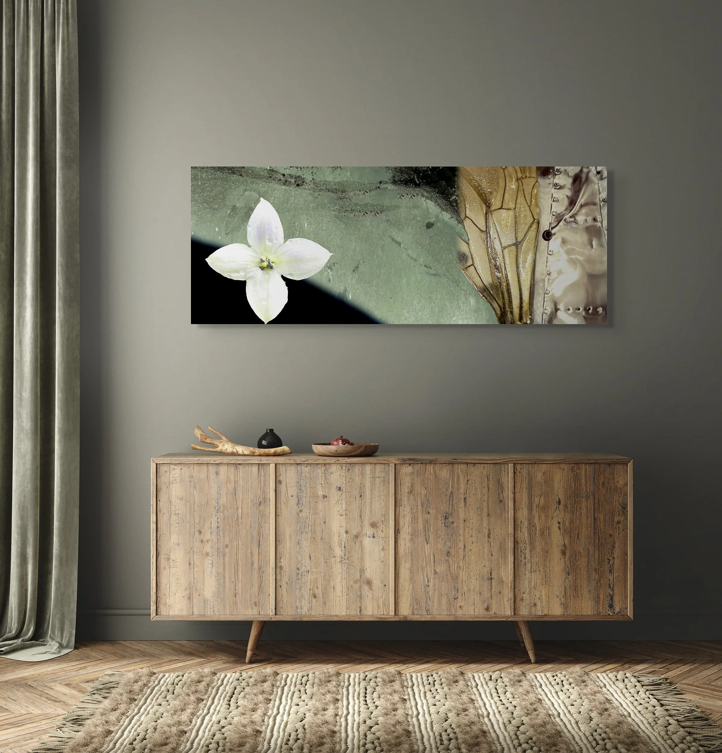 This mock-up shows print of Surrealist digital composite, Cold Fusion, on gray wall, modern room, warm/neutral colors.