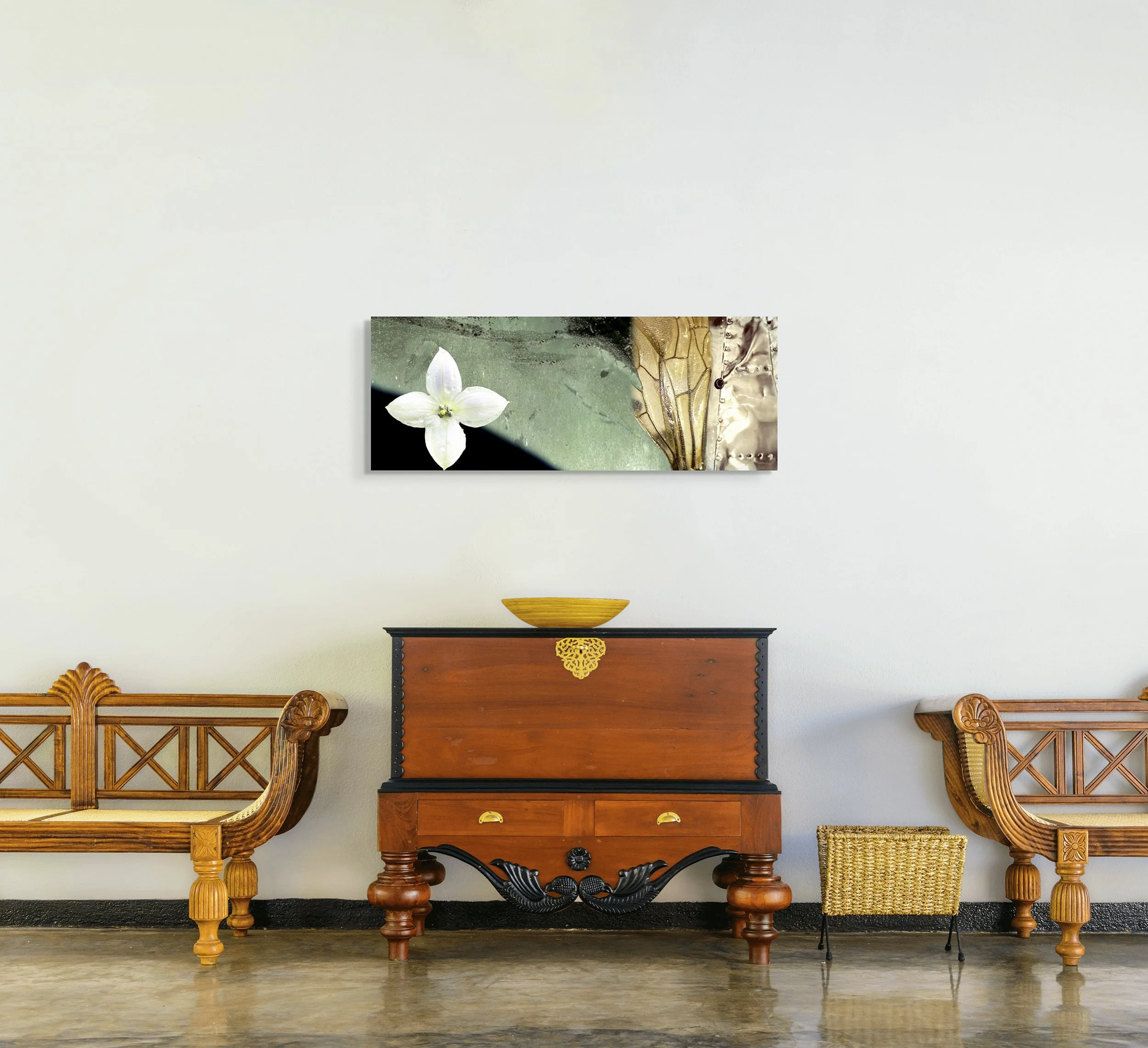 This mock-up shows print of Surreal digital composite, Cold Fusion, on off-white wall of modern room;  furnishings in warm-toned woods with black accents.