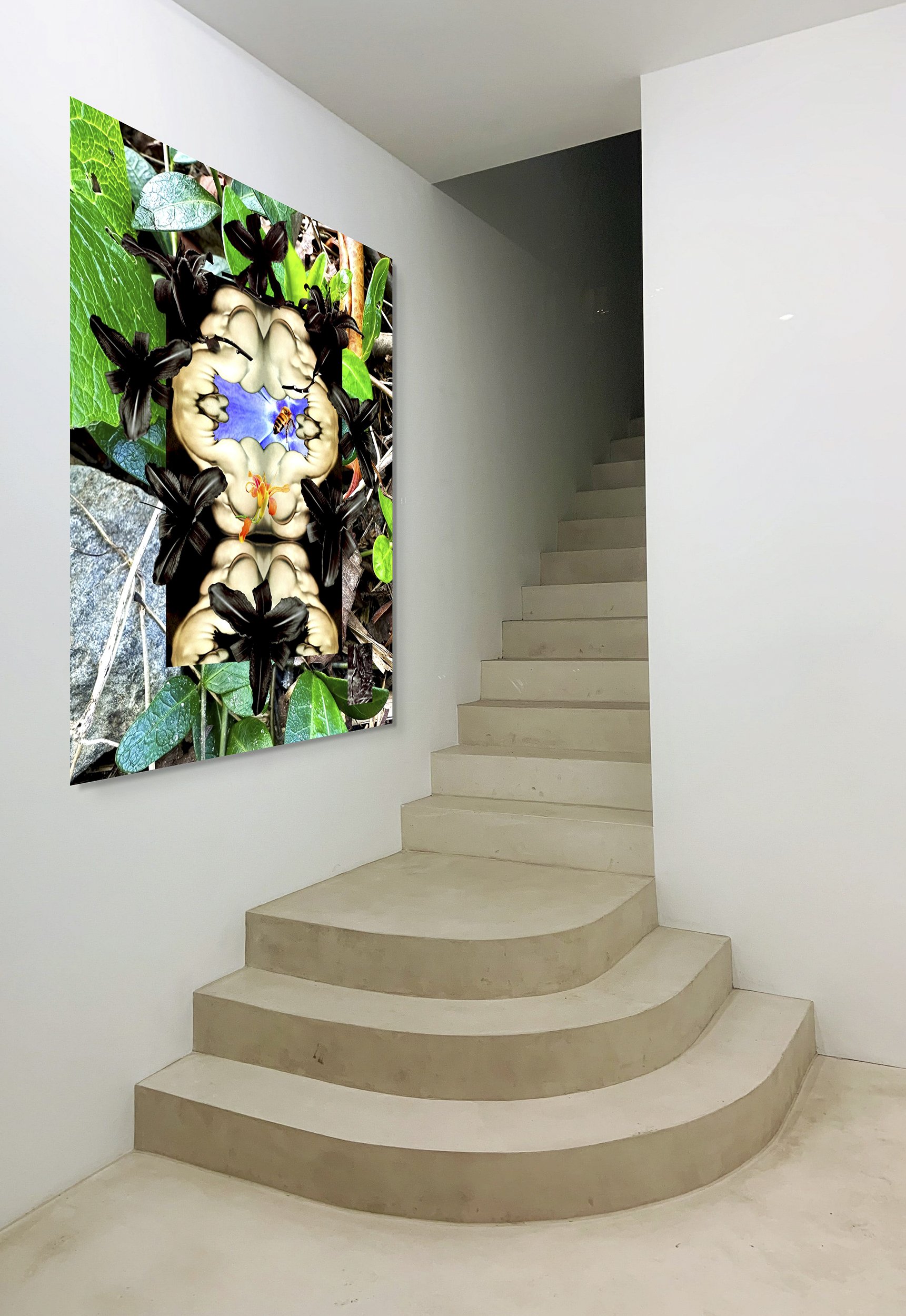 This mock-up shows print of Surrealist digital composite, Xotic, above concrete staircase landing, on pale gray wall, staircase ascending into dark/black shadows.