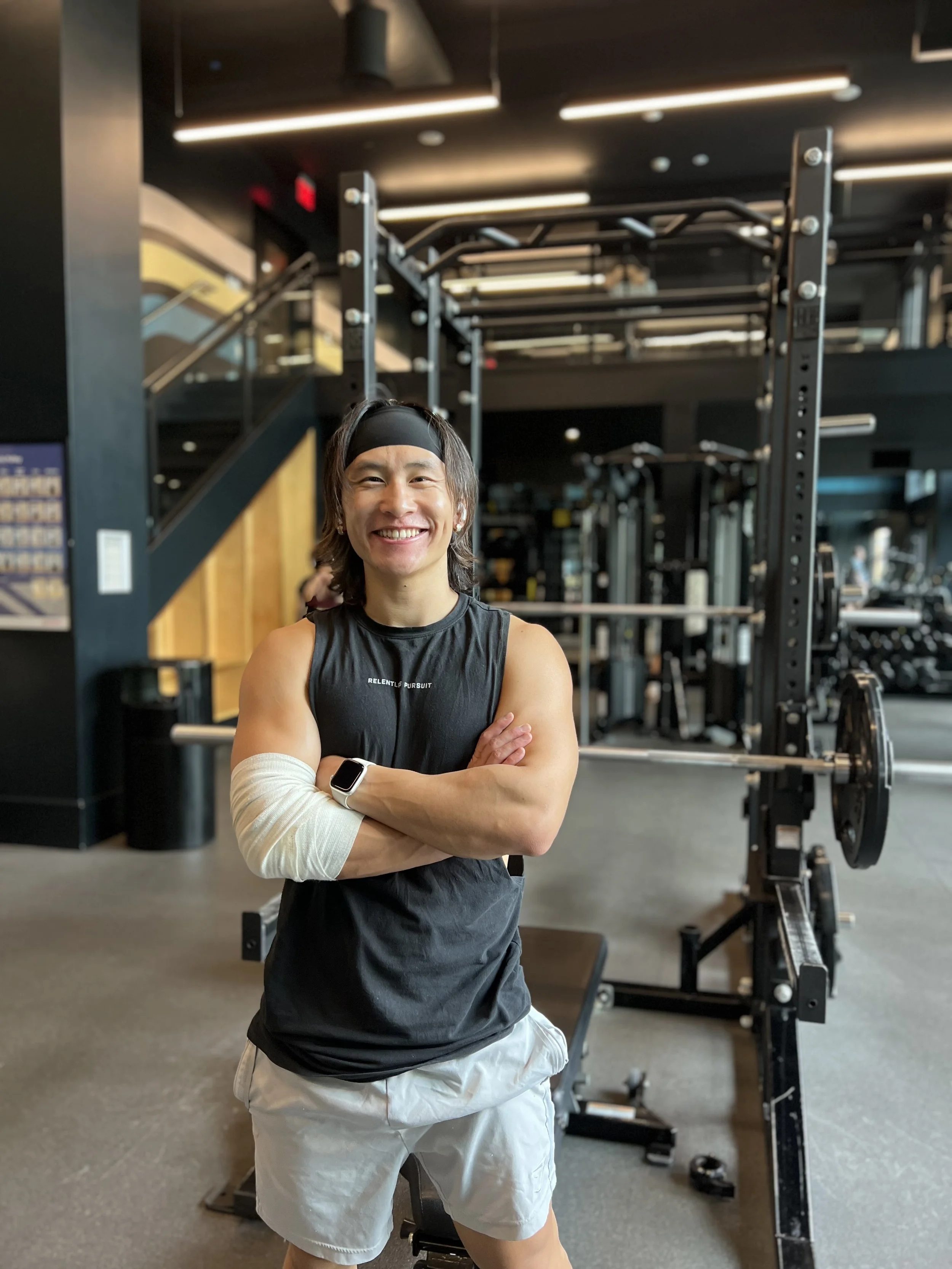 Loshi Vue, Asian American nutritionist at Grain by Grain, offering nutrition coaching with fitness and lifestyle support.