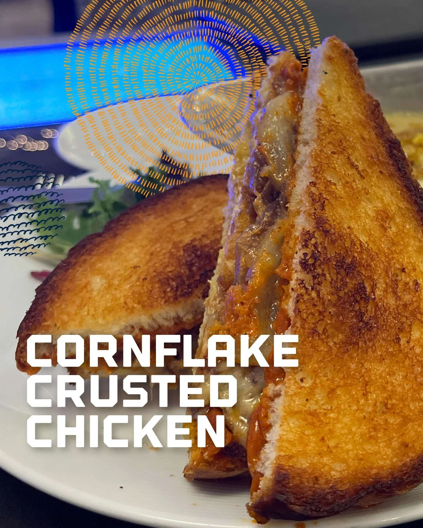 Craving something unique? Try our Cornflake Crusted Chicken! Crispy cornflake-crusted chicken topped with caramelized onions, Manchego cheese, smoked paprika aioli, and tangy Carolina BBQ&mdash;all piled high on toasted sourdough. It's the perfect bl