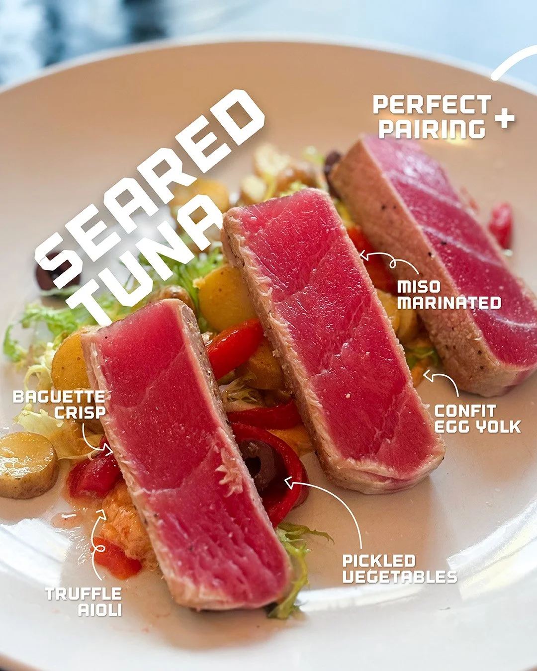 Delicate meets distinctive. Our miso-marinated Seared Tuna with Bahn Mi pickled vegetables, baguette crisp, togarashi black truffle aioli, and confit egg yolk, alongside the Dress to Empress cocktail featuring Empress 1908 Gin, Blonde Lillet, and lem