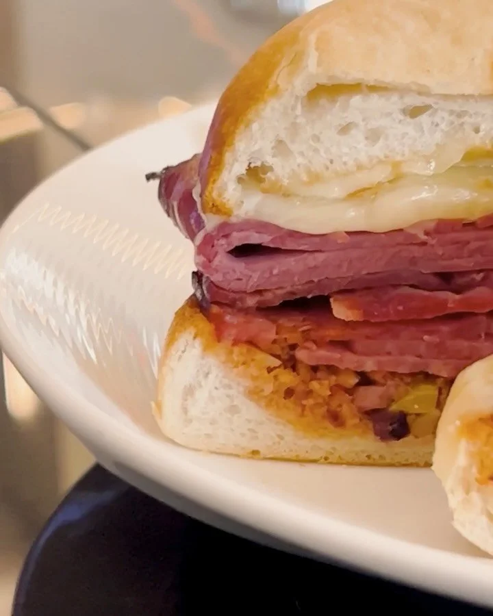 It&rsquo;s National Sandwich Month, and we&rsquo;re celebrating with a classic. Our Muffuletta layers salami, pastrami, capicola, and mozzarella with tapenade and Italian aioli, piled high on toasted ciabatta. Bold, savory, and built for sharing (or 