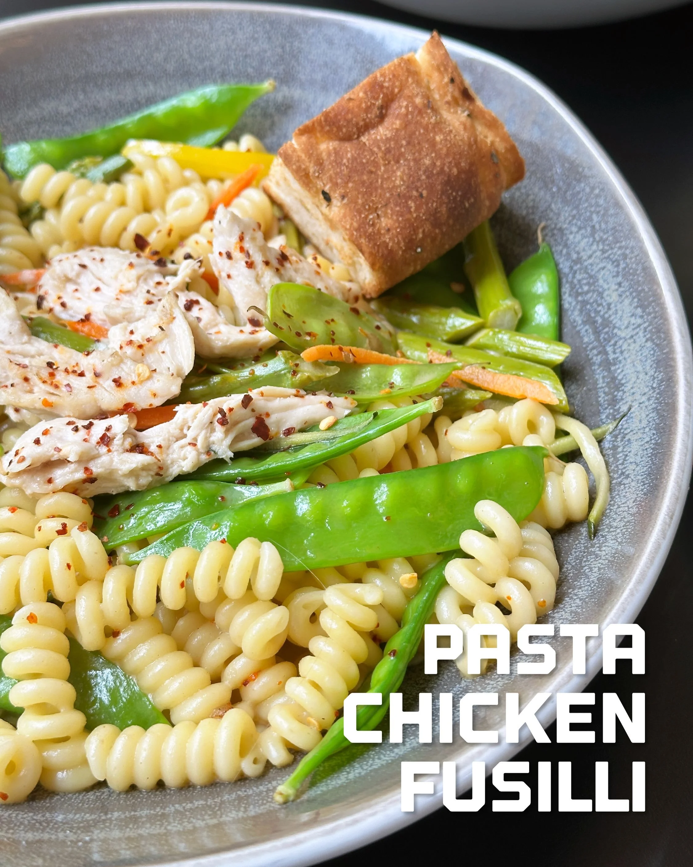 Fresh, vibrant, and full of flavor. Our Pasta Chicken Fusilli brings together asparagus, zucchini, snap peas, and carrots, tossed in a bright lemon butter sauce with parmesan and a kick of crushed red pepper. Garden-fresh comfort food, done right. 

