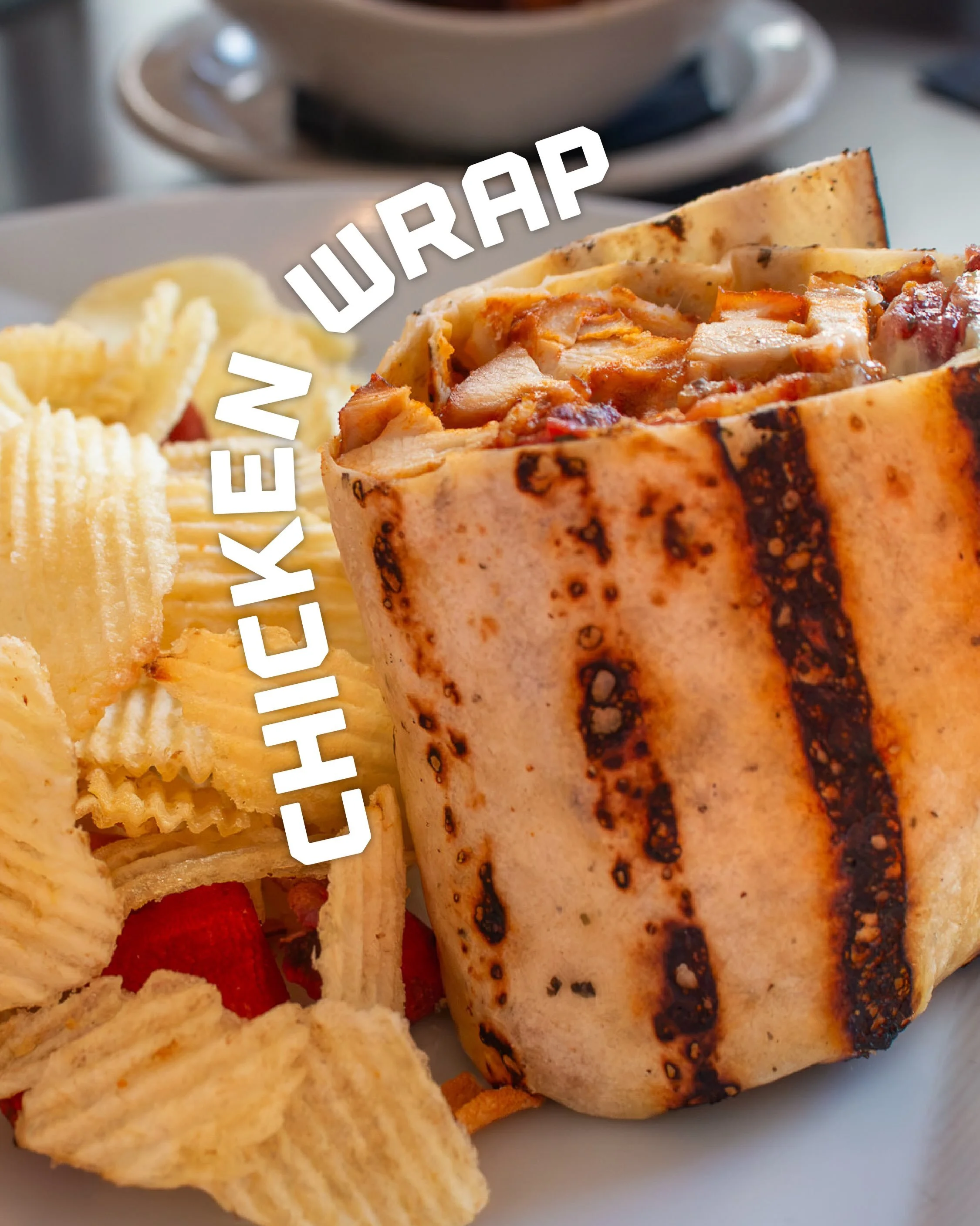 Big flavor, no fork, no slowing down your afternoon. 

CHICKEN WRAP | Mojo Marinade. Bacon. Chihuahua Cheese. Roasted Garlic Cilantro Aioli. 

Citrusy mojo, smoky bacon, garlic aioli that pulls the whole thing together. Two hands required. Napkins pr