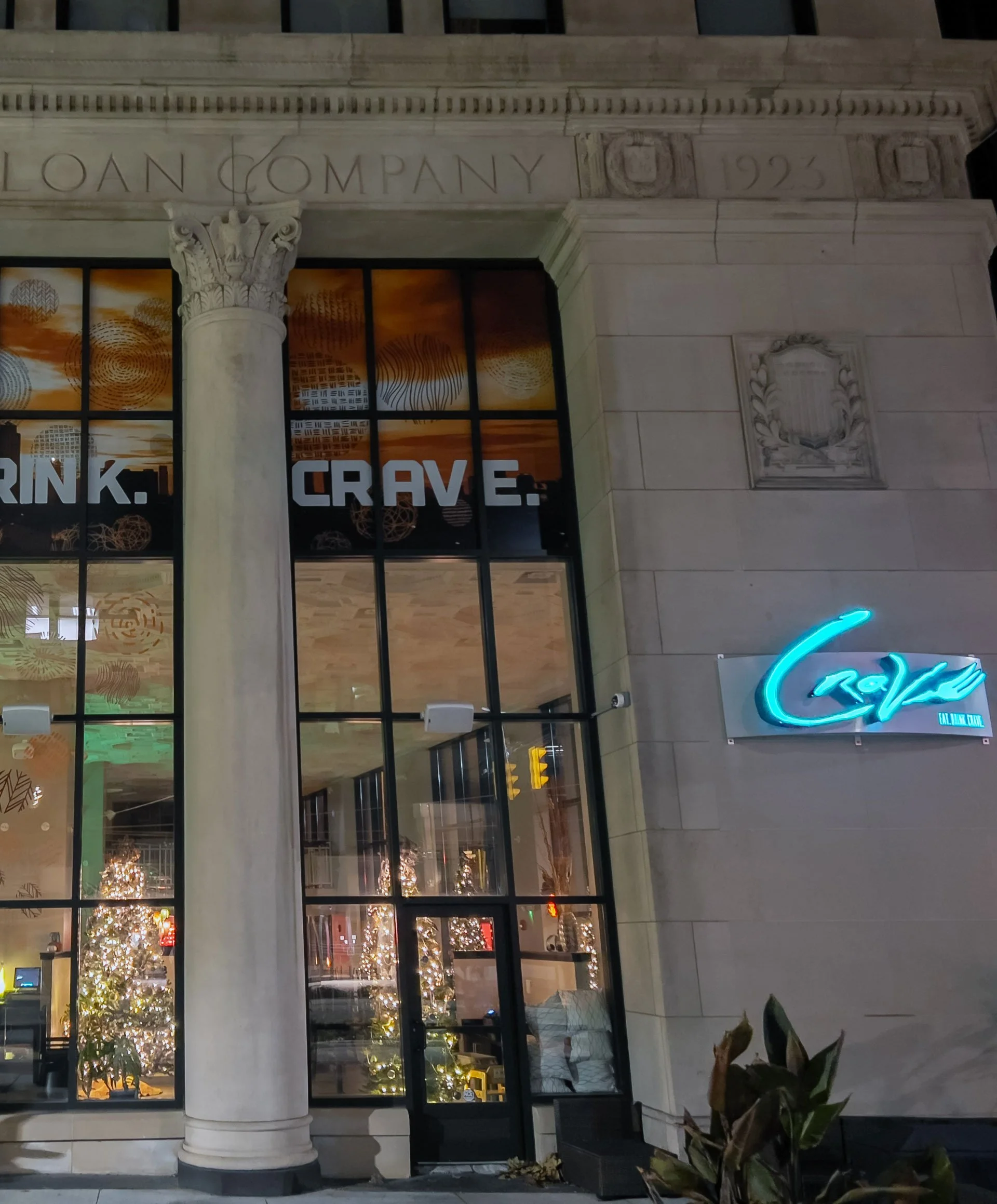 outside-crave-during-winter-holiday-trees-decorated-in-windows-eat-drink-crave-2023.jpg