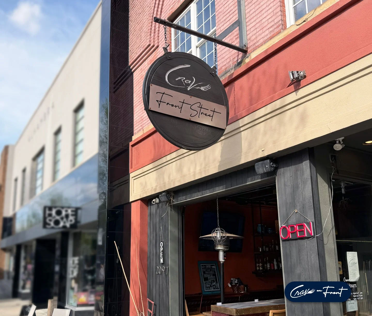 6-crave-on-front-street-cuyahoga-falls-signage-open-garage-patio-door.jpg