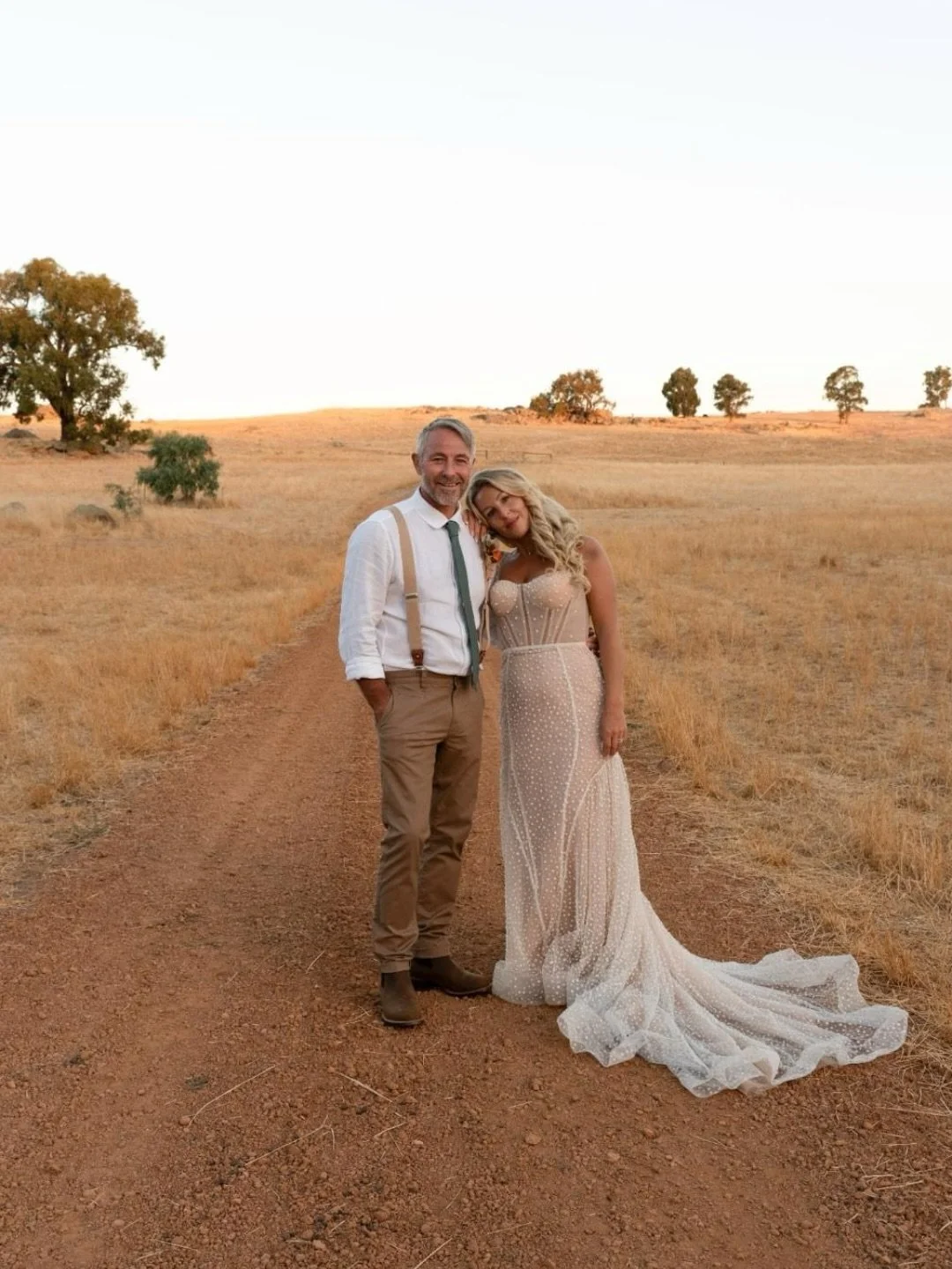 Golden fields, rolling hills and the soft light from the evening sun. Gemma and Scott&rsquo;s portraits feel like a pause in time with just their beautiful family present. 

If you&rsquo;re dreaming of wedding portraits that feel as timeless as this,