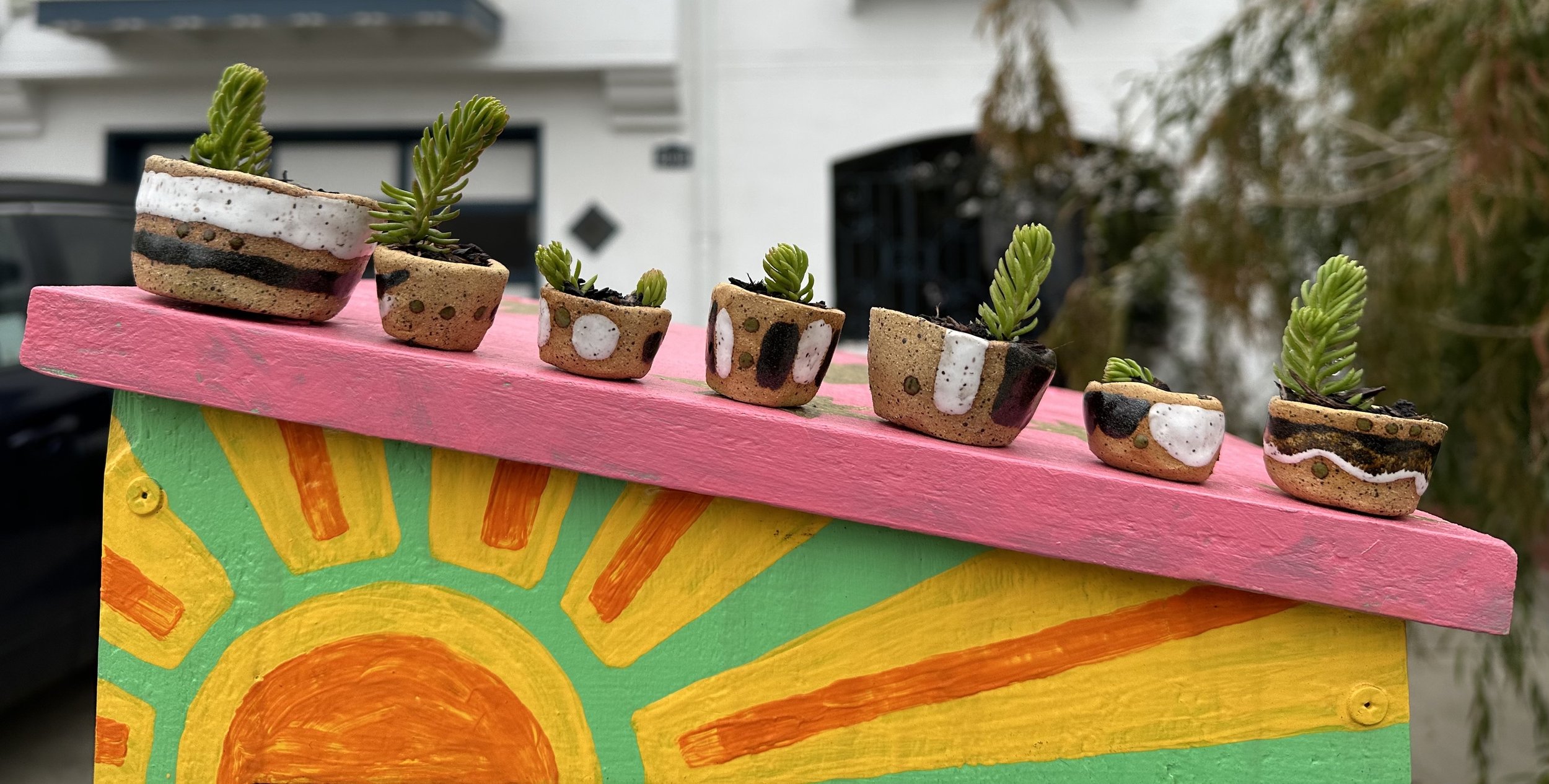 really little plant pots, fresh out of the kiln!
