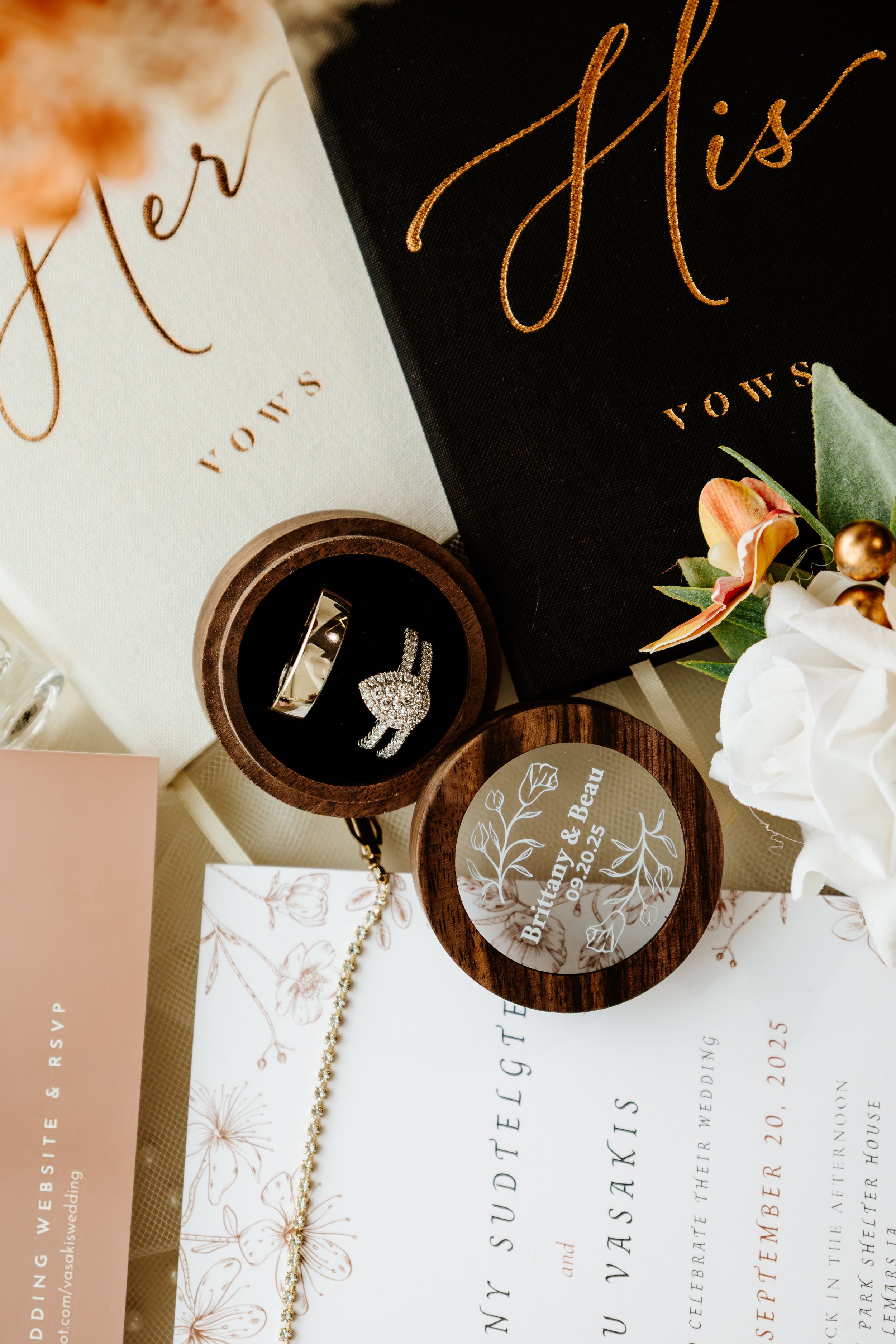 Wedding invitation, rings in a wooden box, birthday or wedding keepsake with floral design, white and gold flowers, and a sparkly bracelet in Sioux Falls, South Dakota.