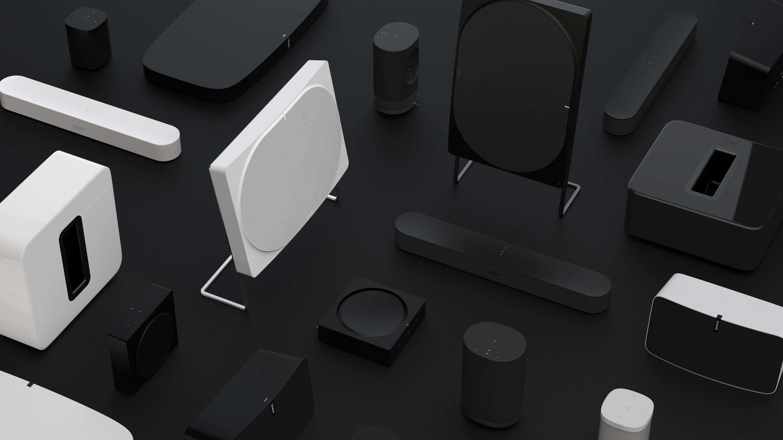 Seven by Sonos non-commercial student concept by Kai Rump, black and white variants, complete product family on dark ground surface.