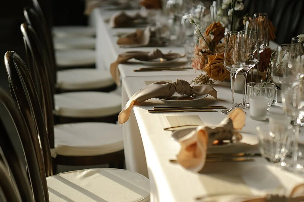 Modern wedding tablescape with contemporary flower arrangements