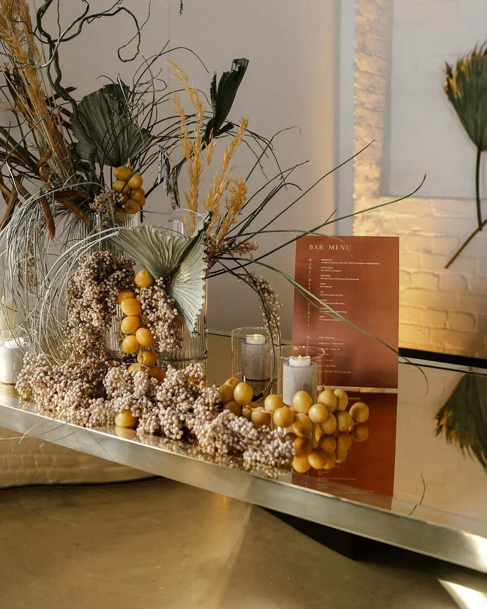 Bespoke bar set up with contemporary florals by Still Life Flowers