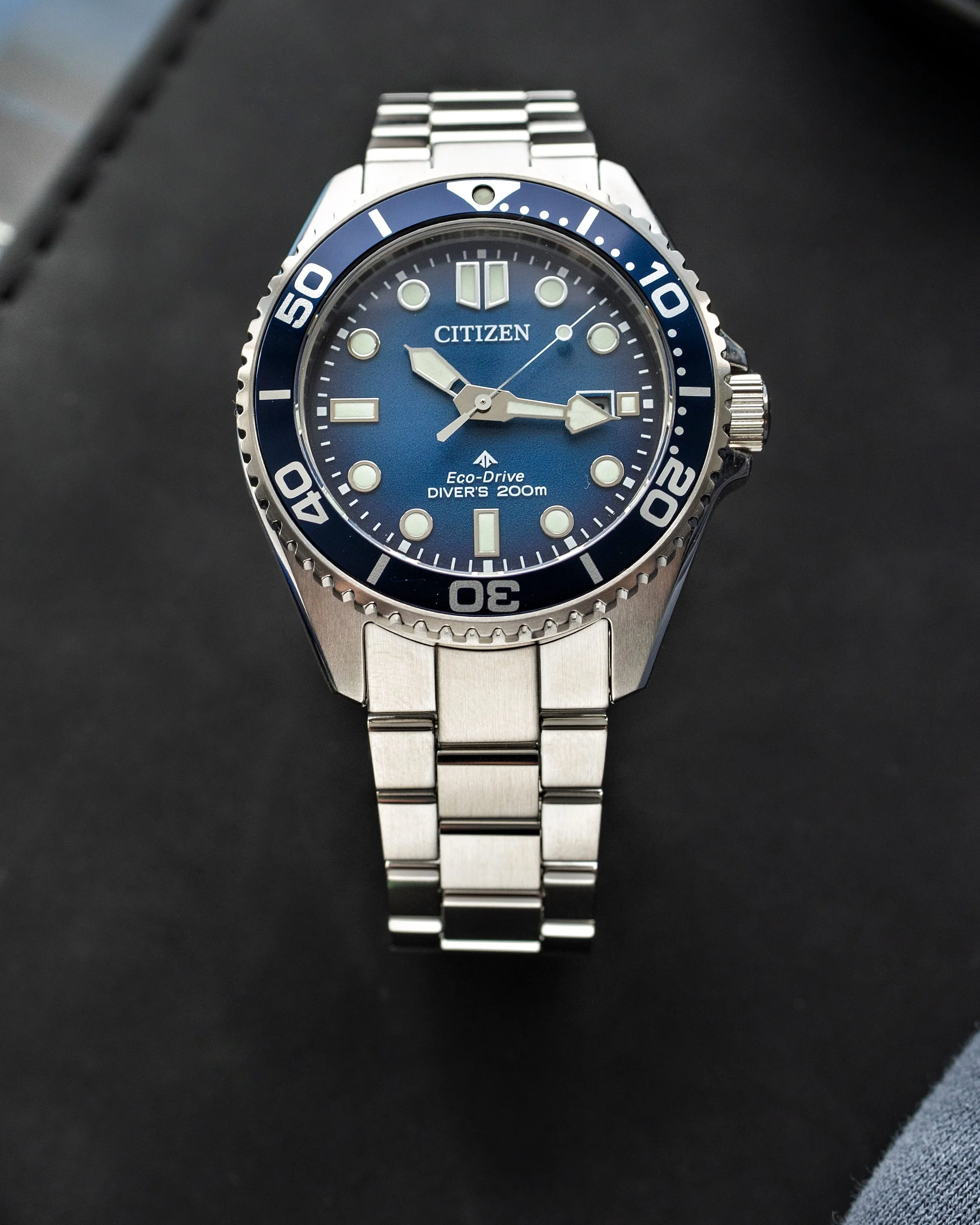 Citizen Promaster BN0260-54L Eco-Drive diver with blue gradient dial and stainless-steel bracelet.