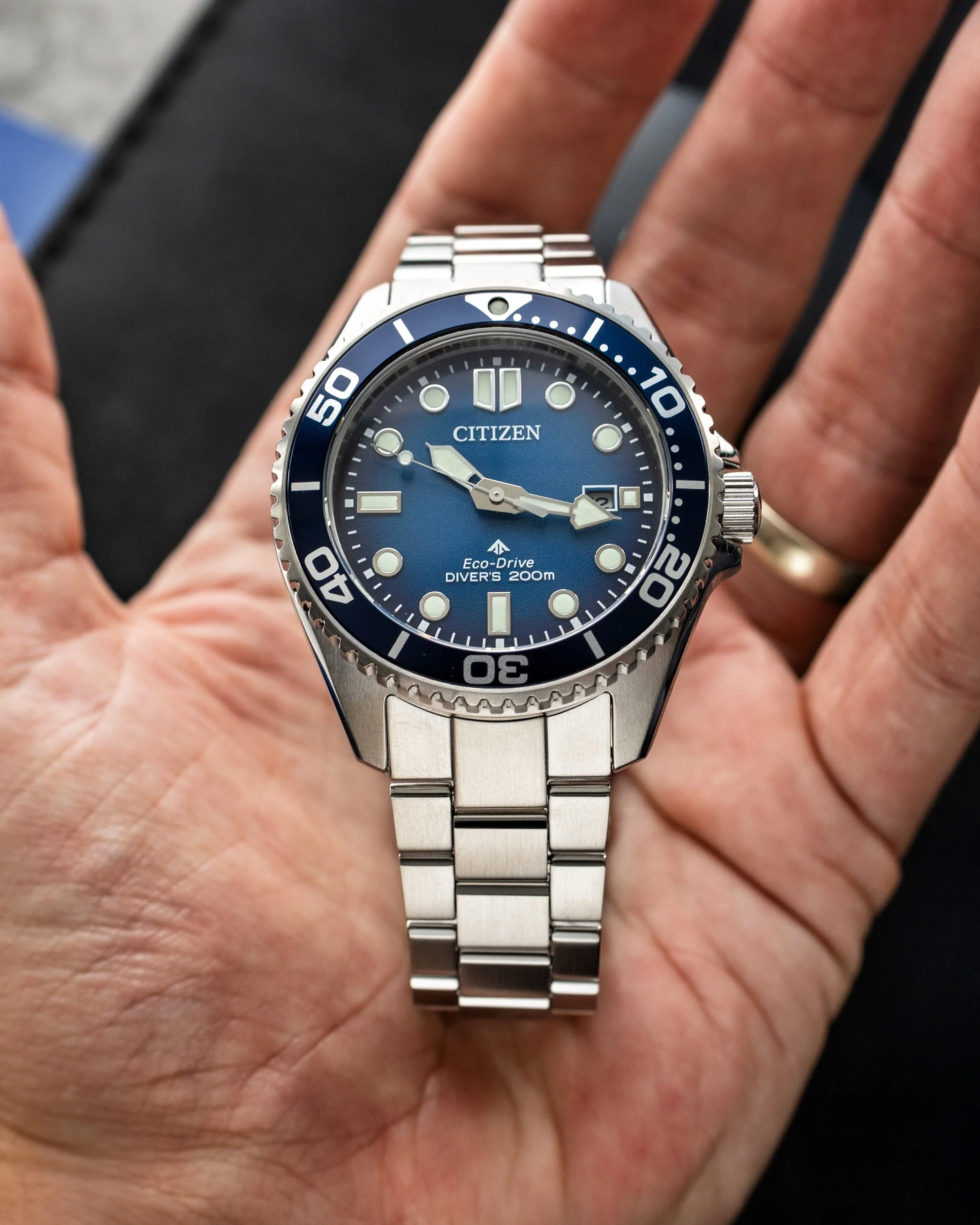 Citizen Promaster BN0260-54L held in hand showing the 41mm case size and blue gradient dial.