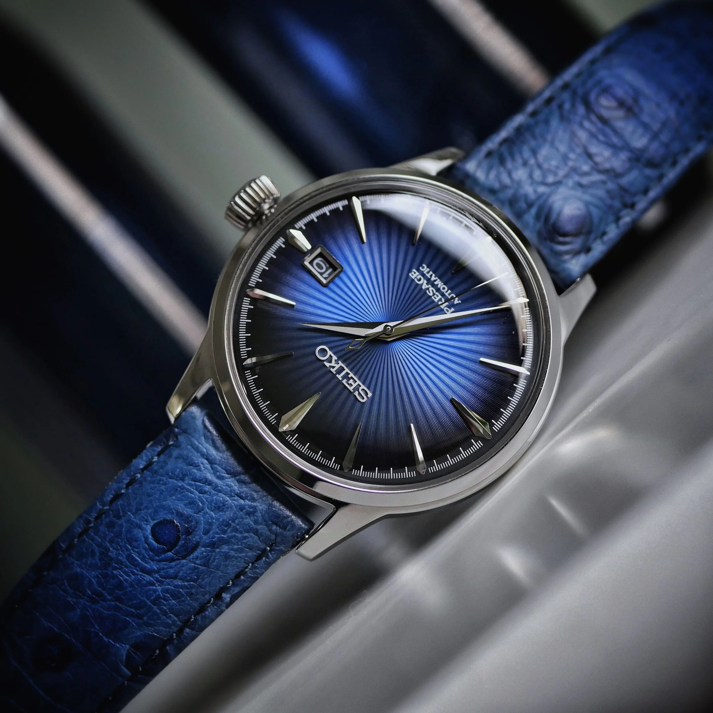Angled view of the Seiko Presage Blue Moon SRPB41J1 with its blue dial and leather strap