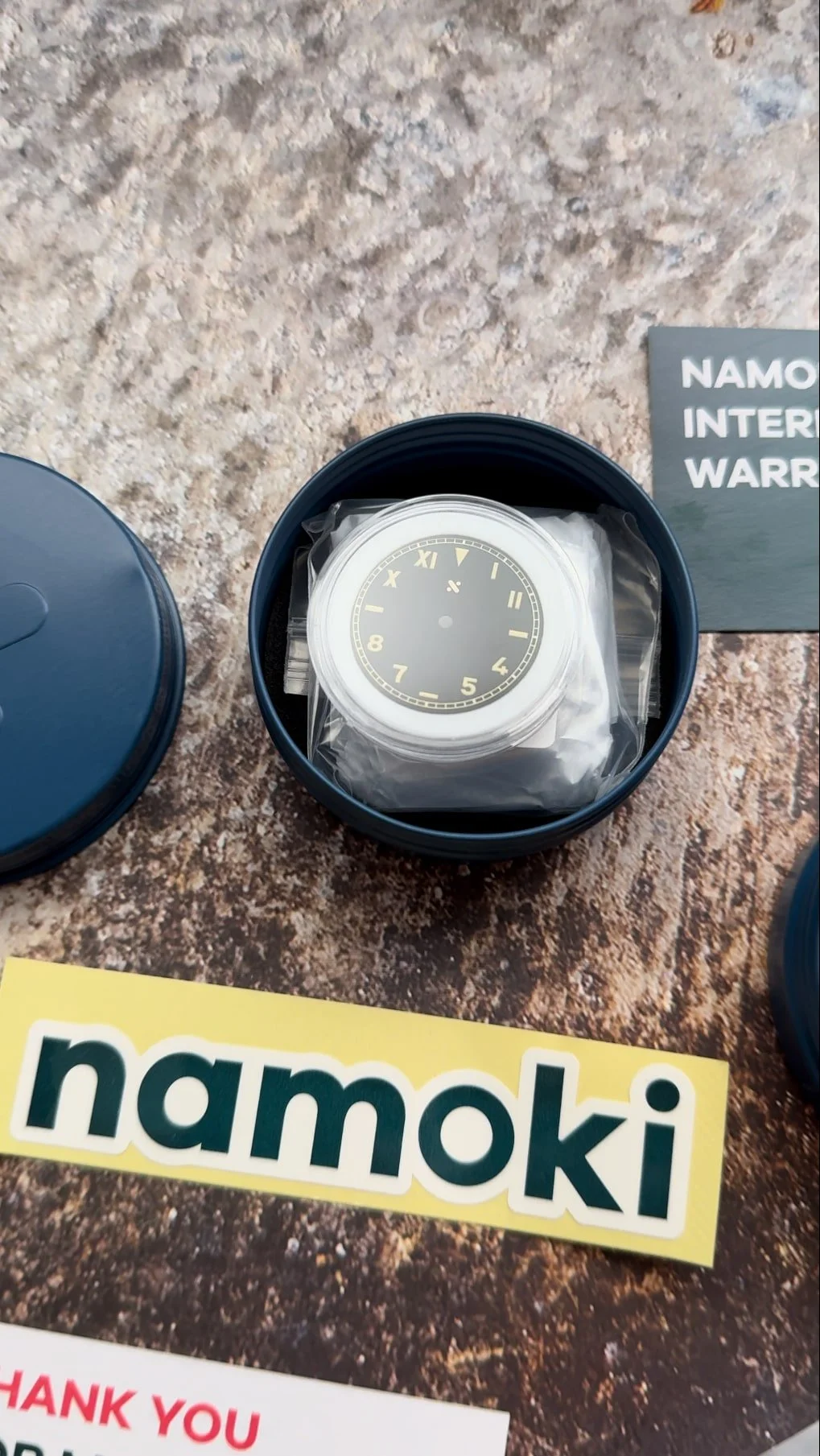 Black Namoki California dial with cream numerals in its protective packaging