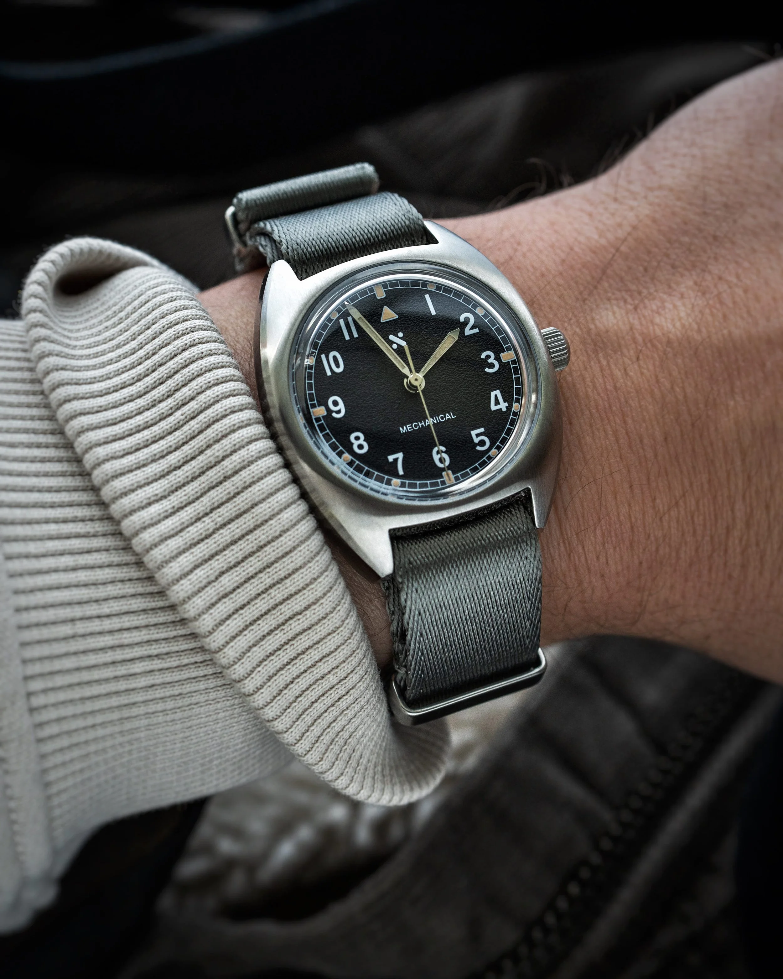 Namoki Mods NMK21 pilot watch on wrist with grey NATO strap