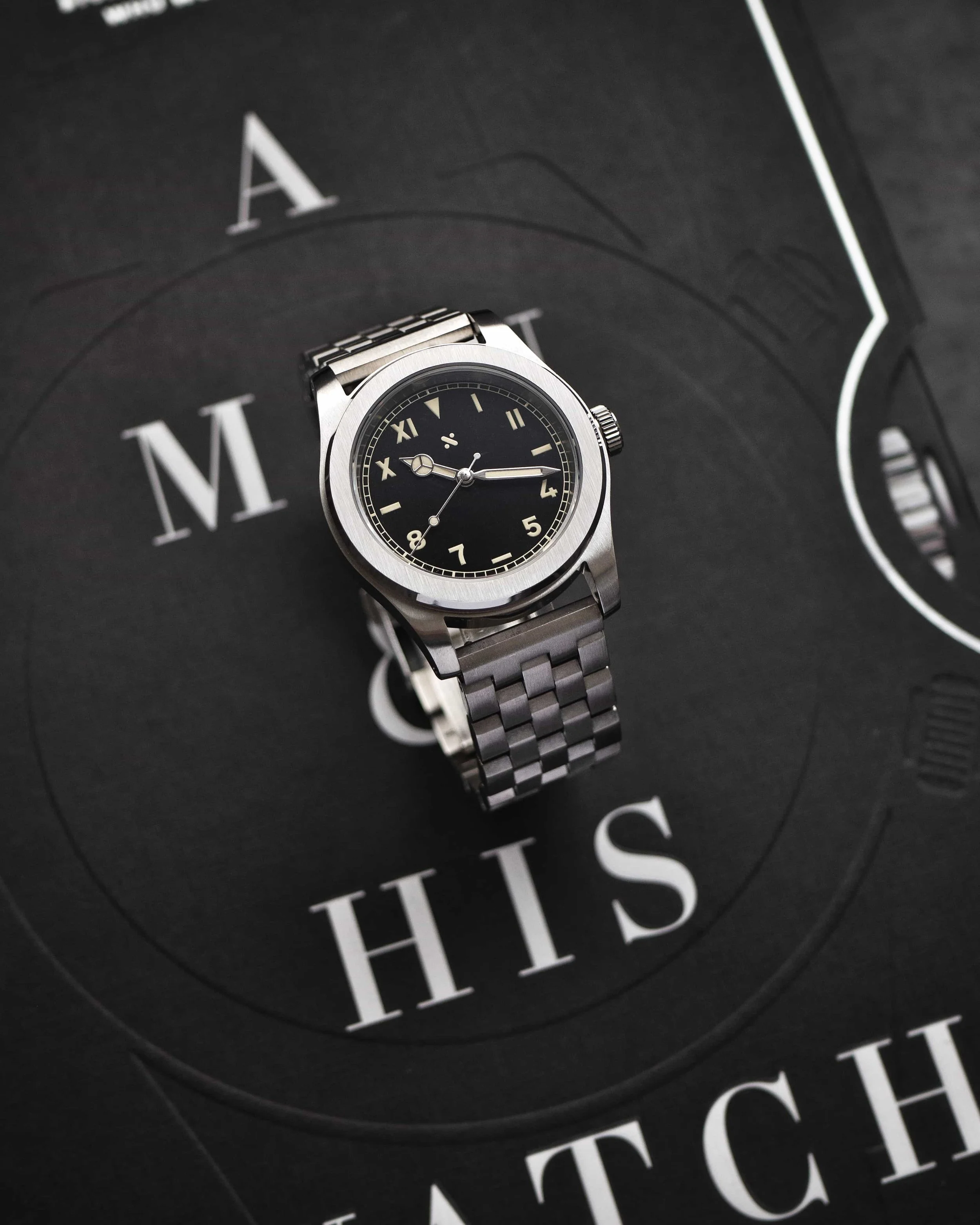Completed Namoki NMK931 watch with California dial, Mercedes hands and steel five-link bracelet