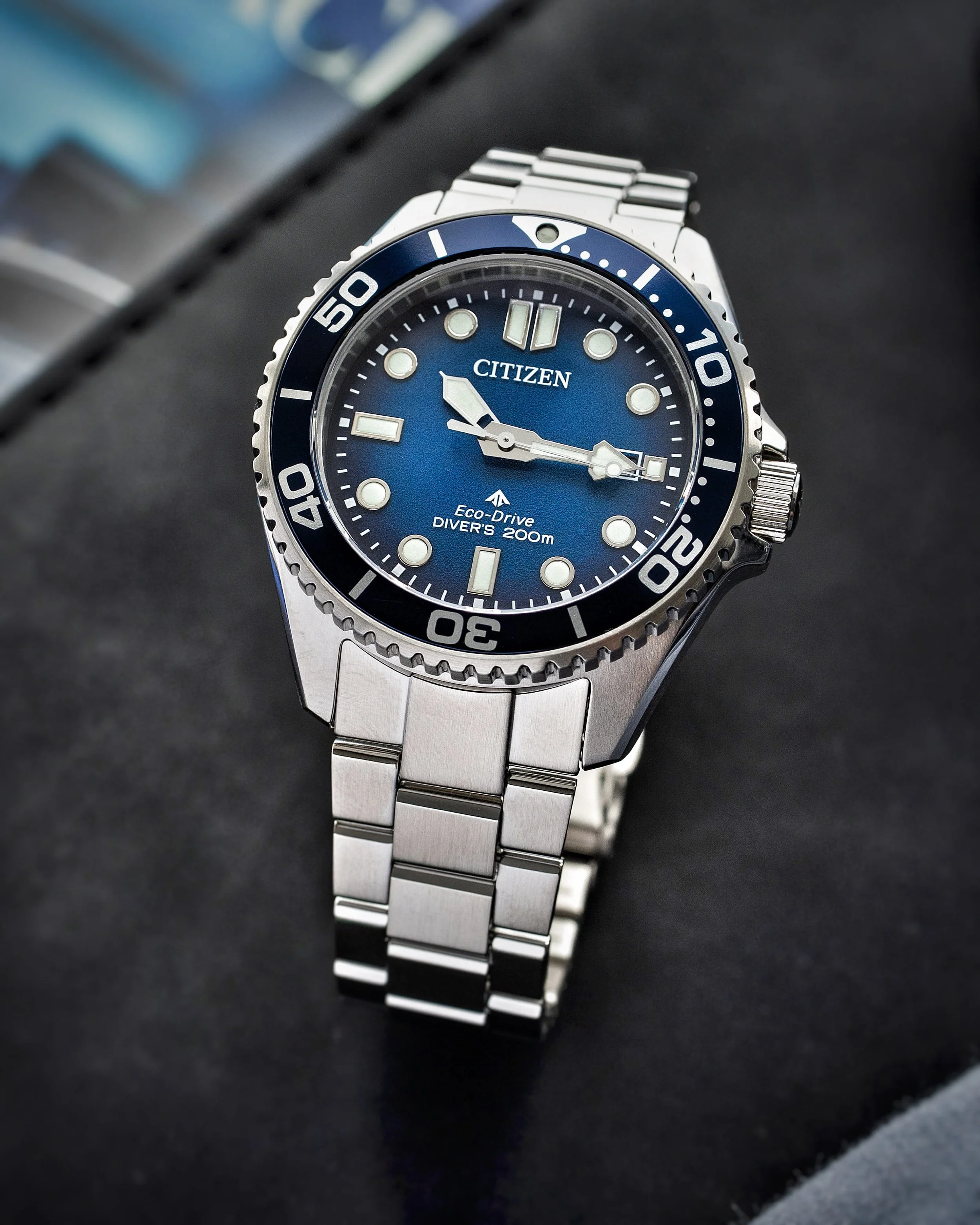 Citizen Promaster BN0260-54L Eco-Drive diver with blue gradient dial and stainless-steel bracelet.