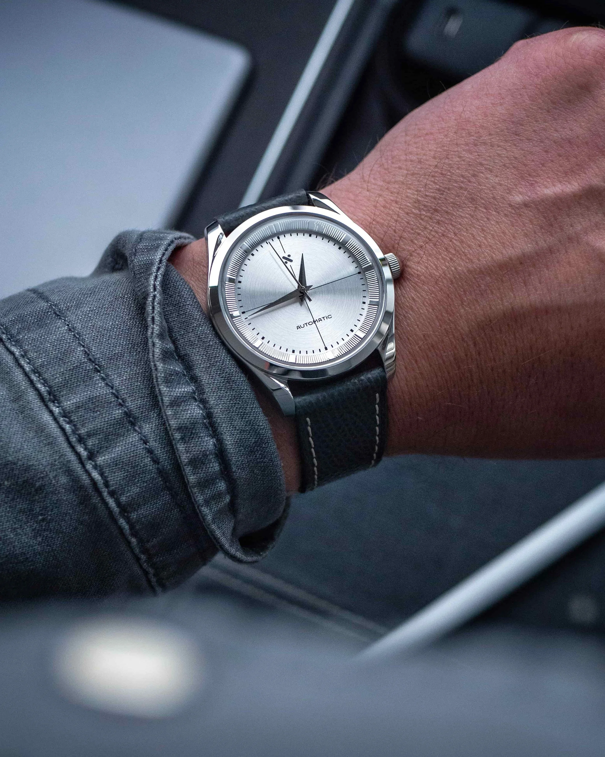 Namoki Polerouter-inspired build worn on a grey leather strap