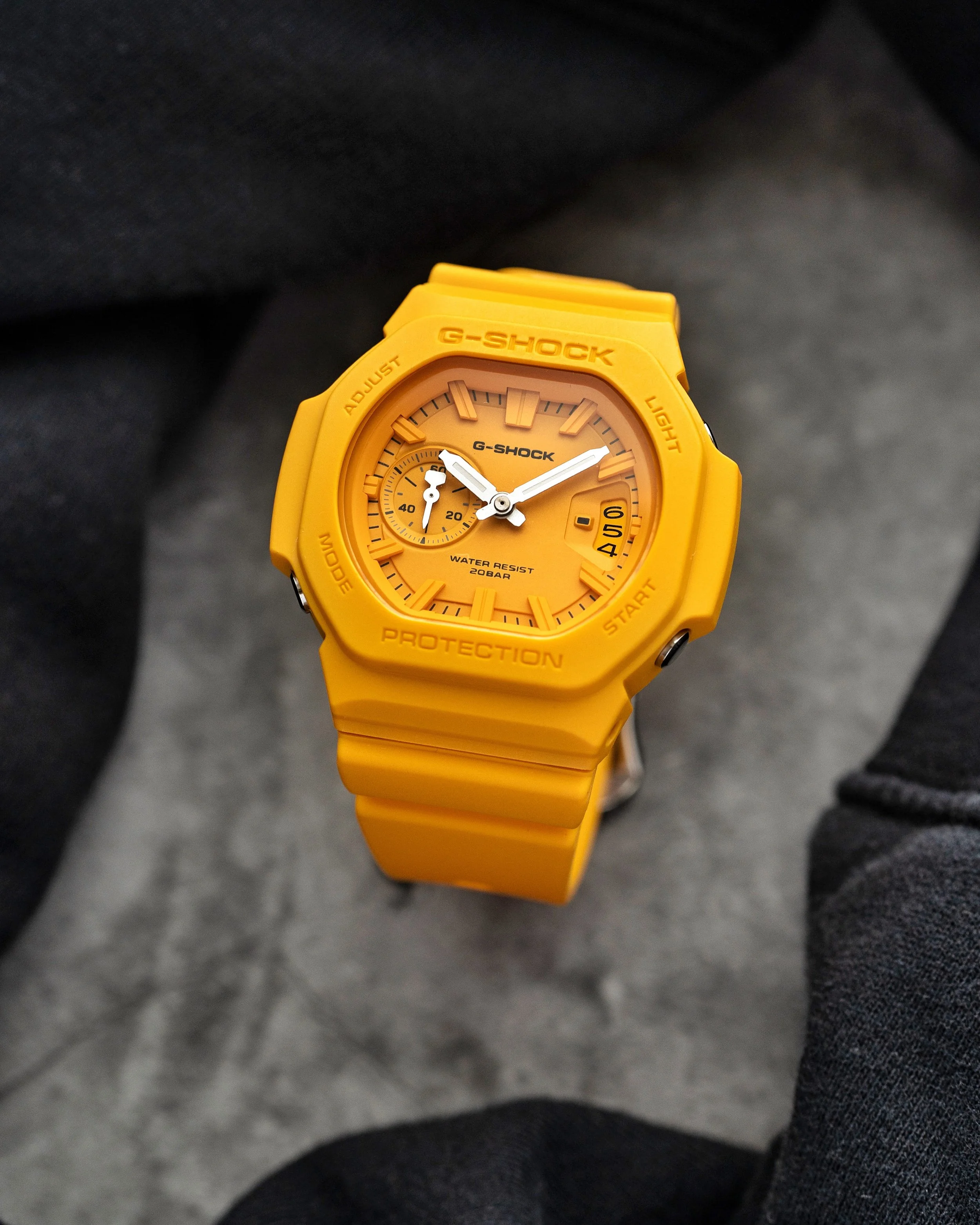 Casio G-SHOCK GAC-2500-9A CasioNaut in warm yellow resin, featuring a matching analogue dial, white hands, raised hour markers and sculpted protective bezel.