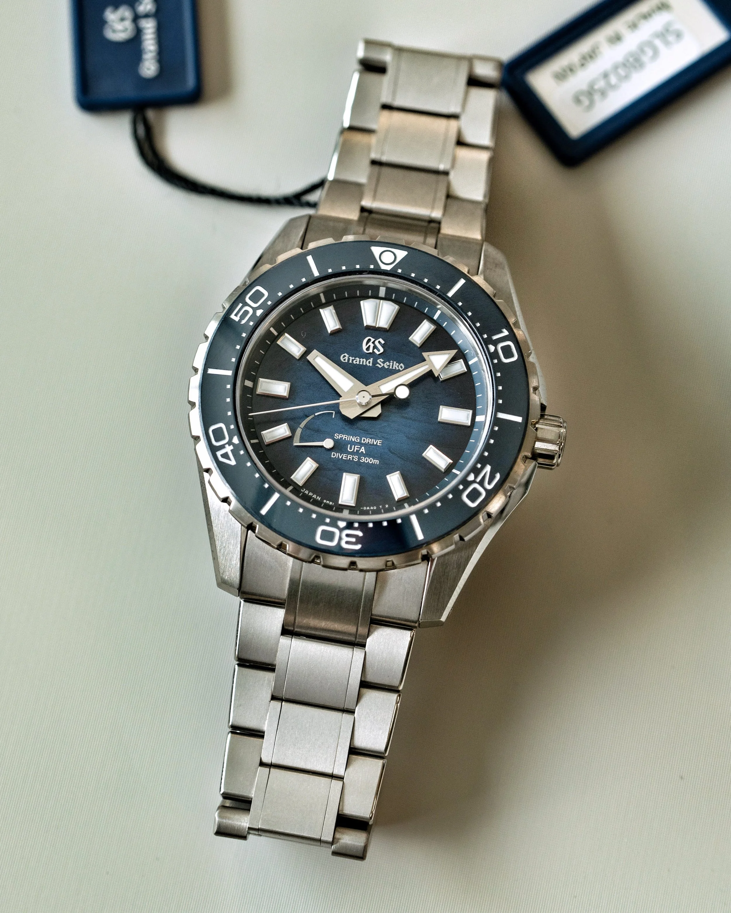 Grand Seiko SLGB023 Ushio 300 Diver with blue textured dial and titanium bracelet during a hands-on preview.