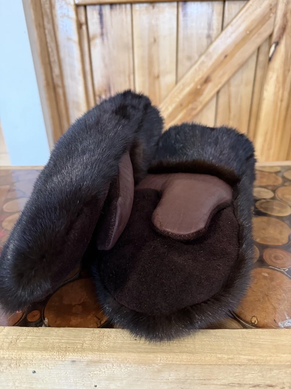Repurposed mink coat into mink fur mitts, sheepskin liner, bison leather