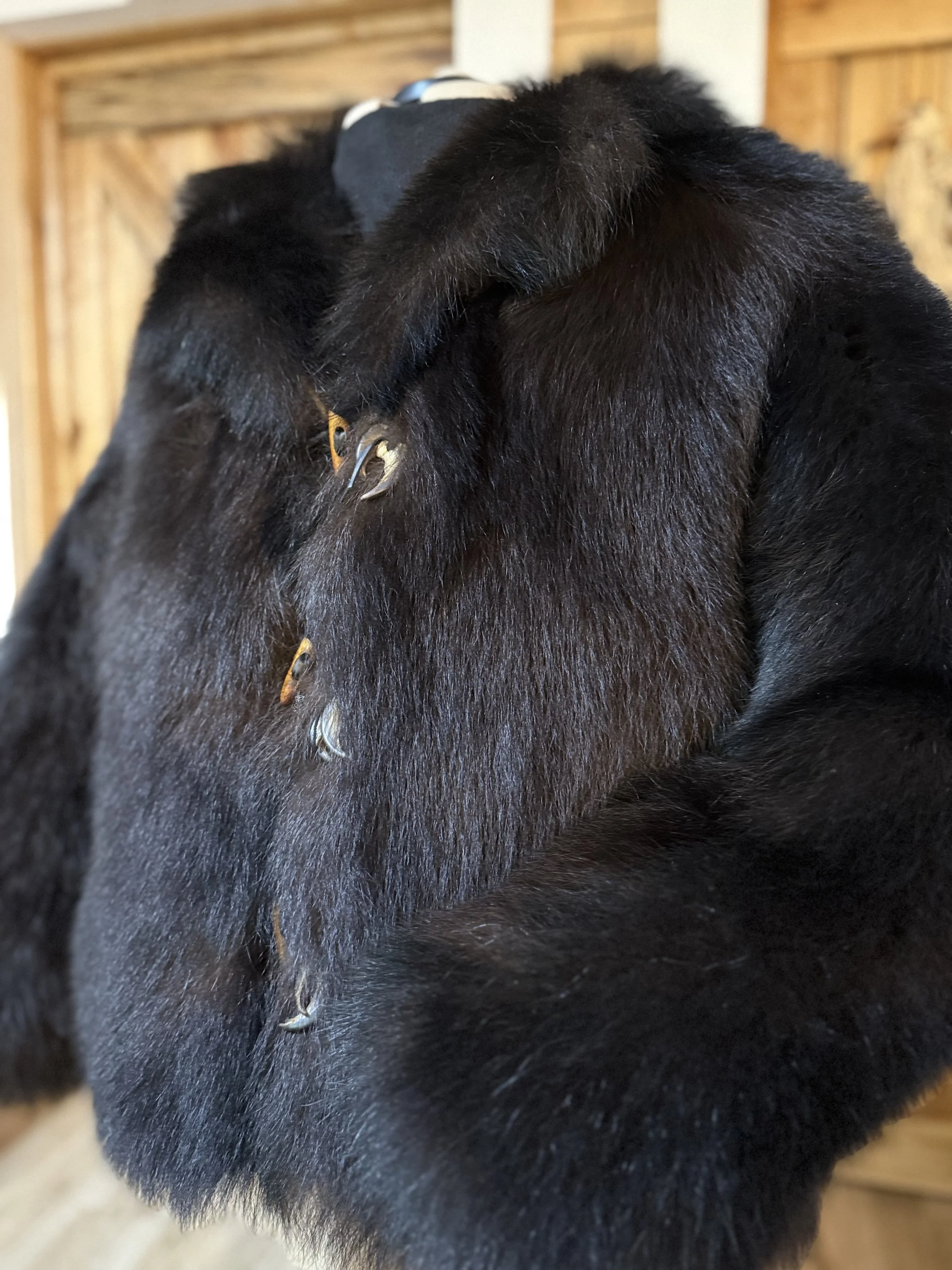 Black bear coat, wood/leather toggles with claws