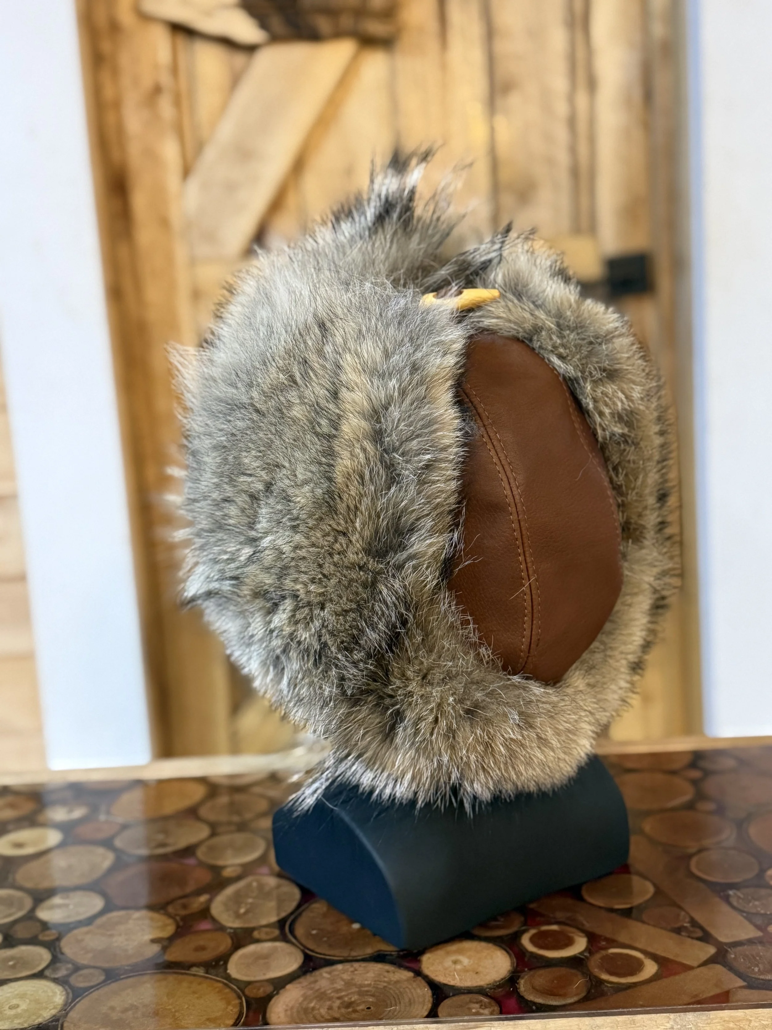 Coyote trapper hat, bison leather