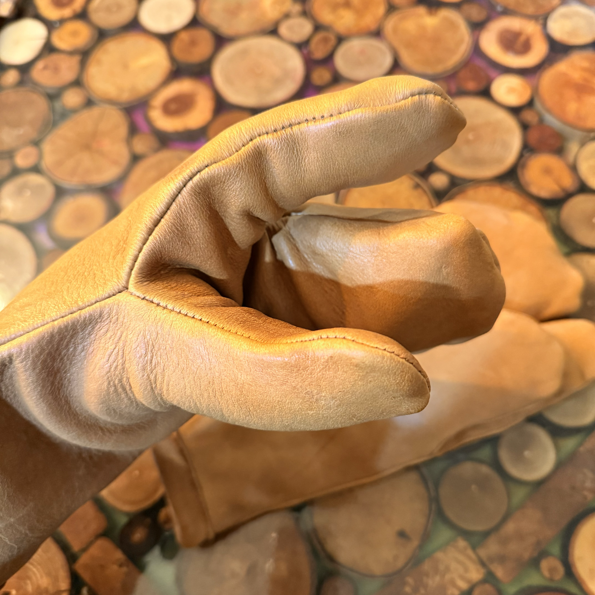 Split finger mitt, deer leather, sewn in wool liner.