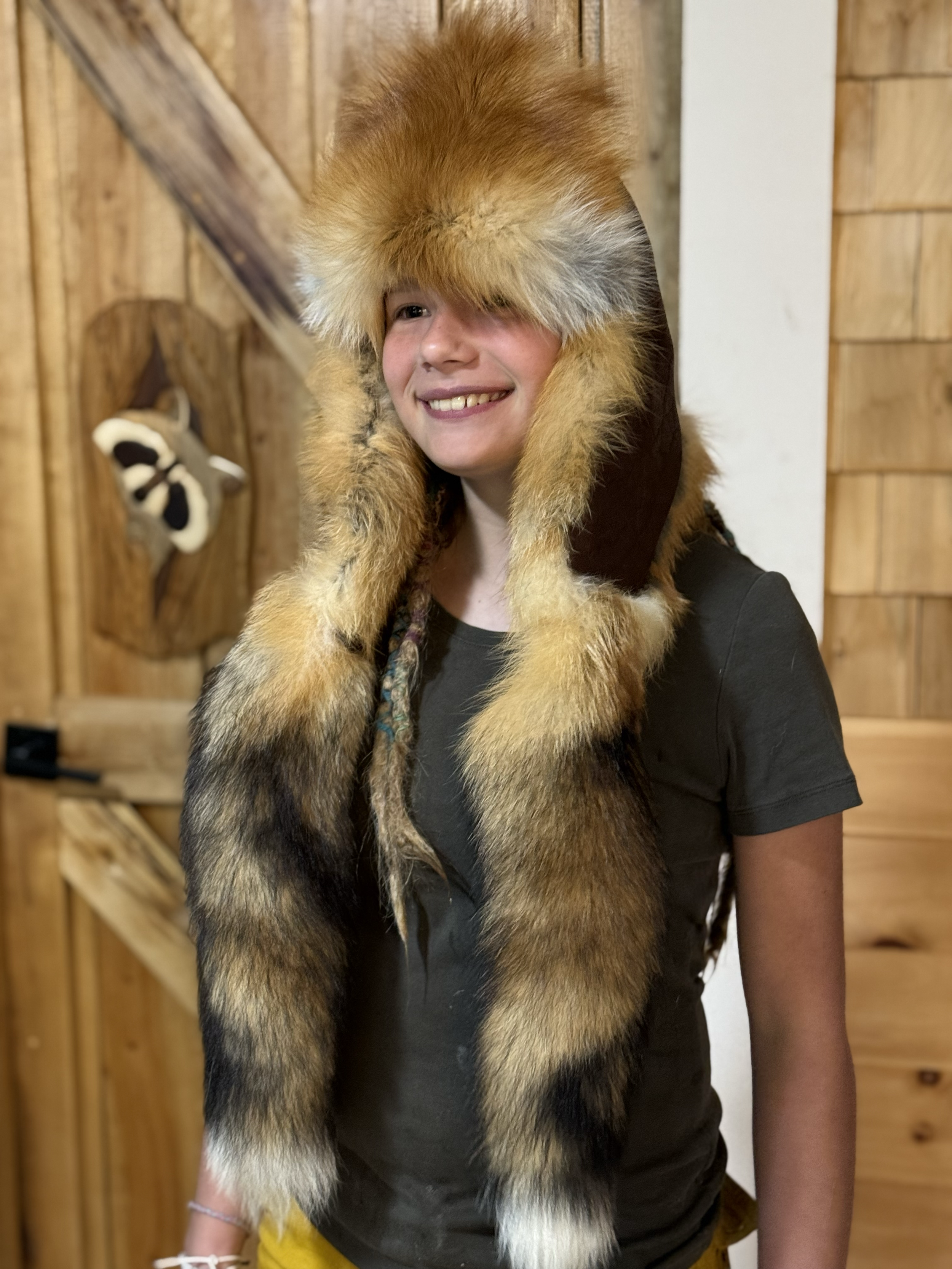 Brown bison leather, fox fur trapper hat with two tails-down