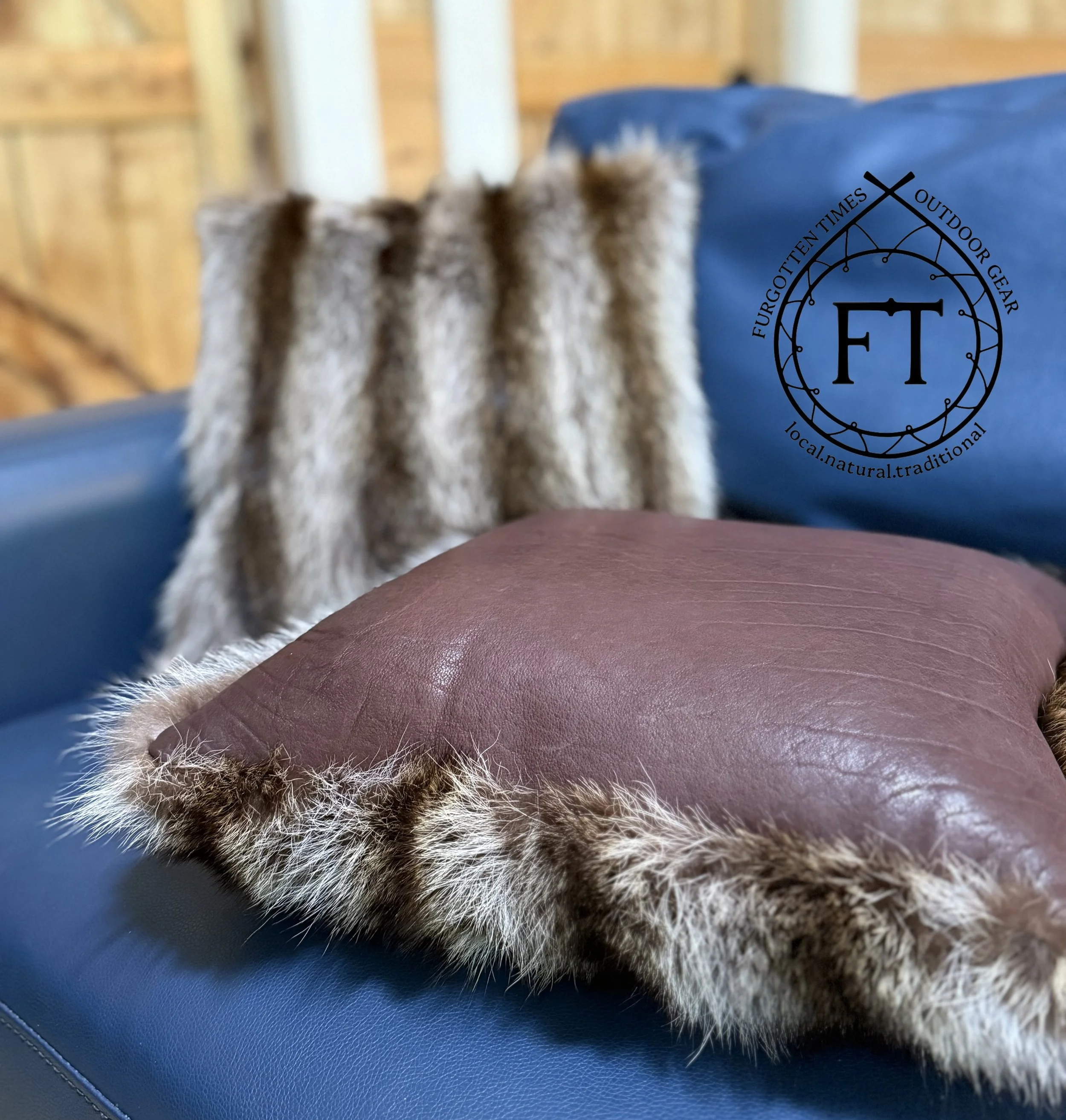 Repurposed raccoon fur coat pillows, bison leather backing, goose feather pillow inner.