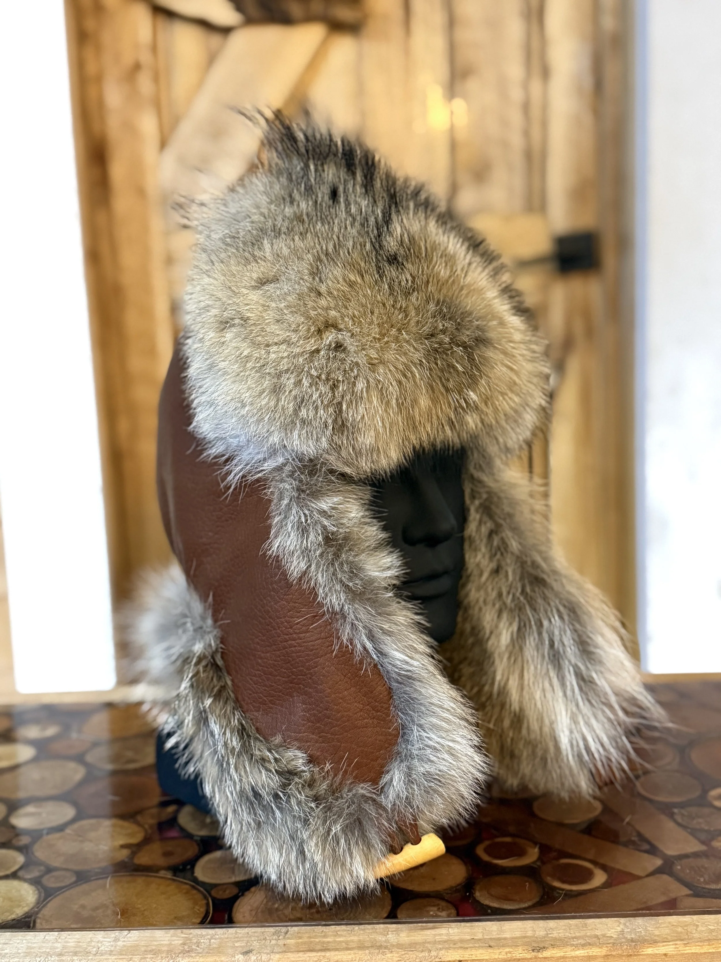 Coyote trapper hat, bison leather